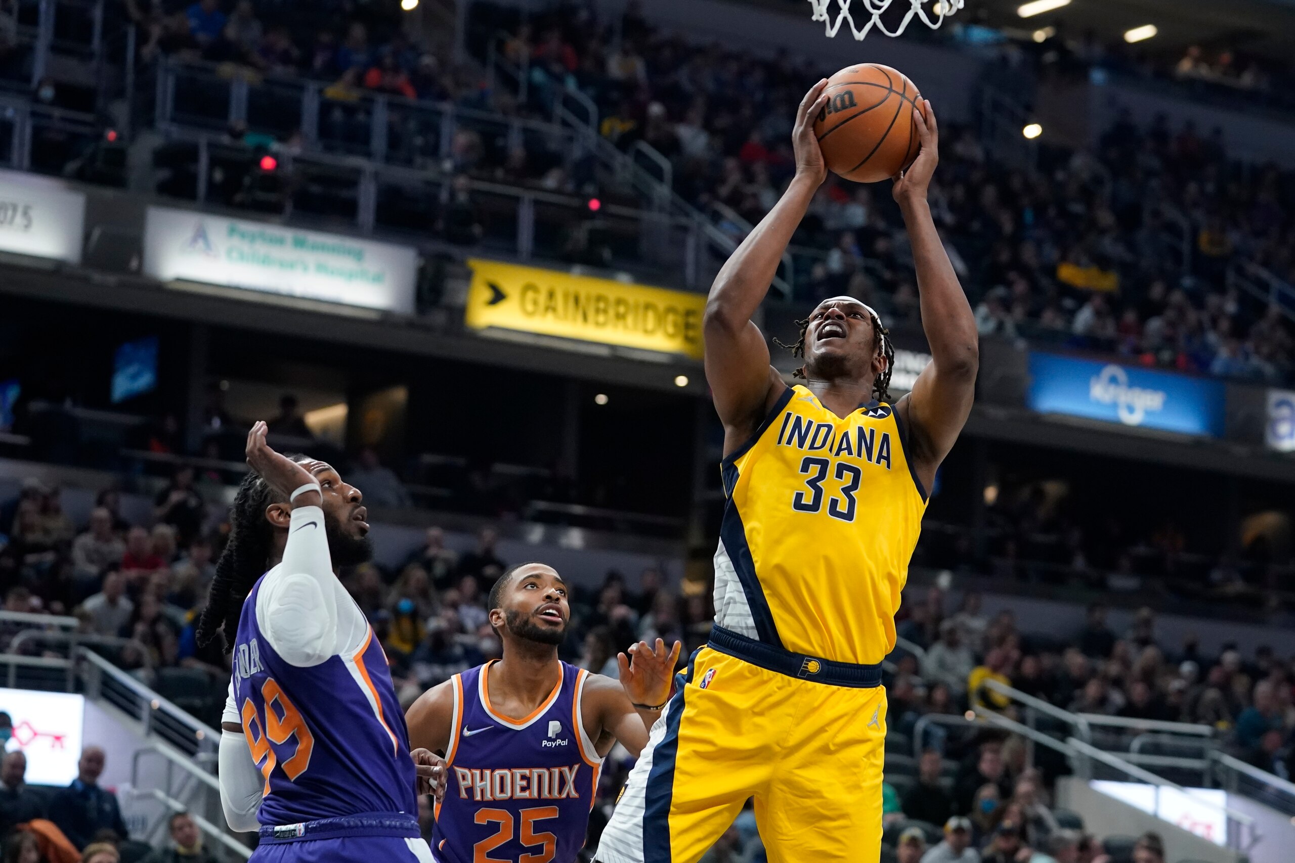 Indiana Pacers' Myles Turner (33) shoots during the first half of an NBA basketball game against the Phoenix Suns, Friday, Jan. 14, 2022, in Indianapolis. (AP Photo/Darron Cummings)