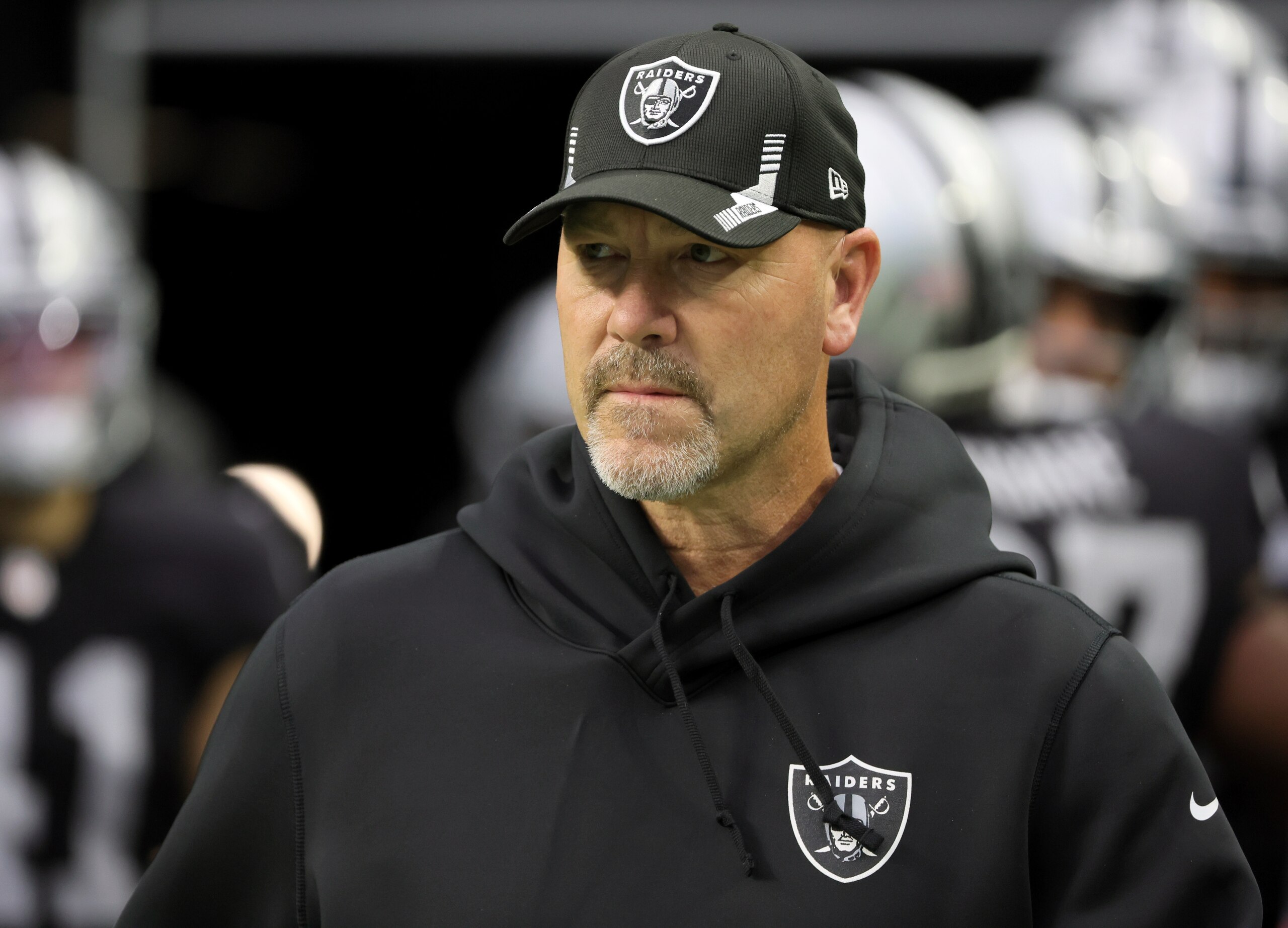 LAS VEGAS, NEVADA - DECEMBER 26:  Defensive coordinator Gus Bradley of the Las Vegas Raiders walks onto the field for a game against the Denver Broncos at Allegiant Stadium on December 26, 2021 in Las Vegas, Nevada. The Raiders defeated the Broncos 17-13.  (Photo by Ethan Miller/Getty Images)