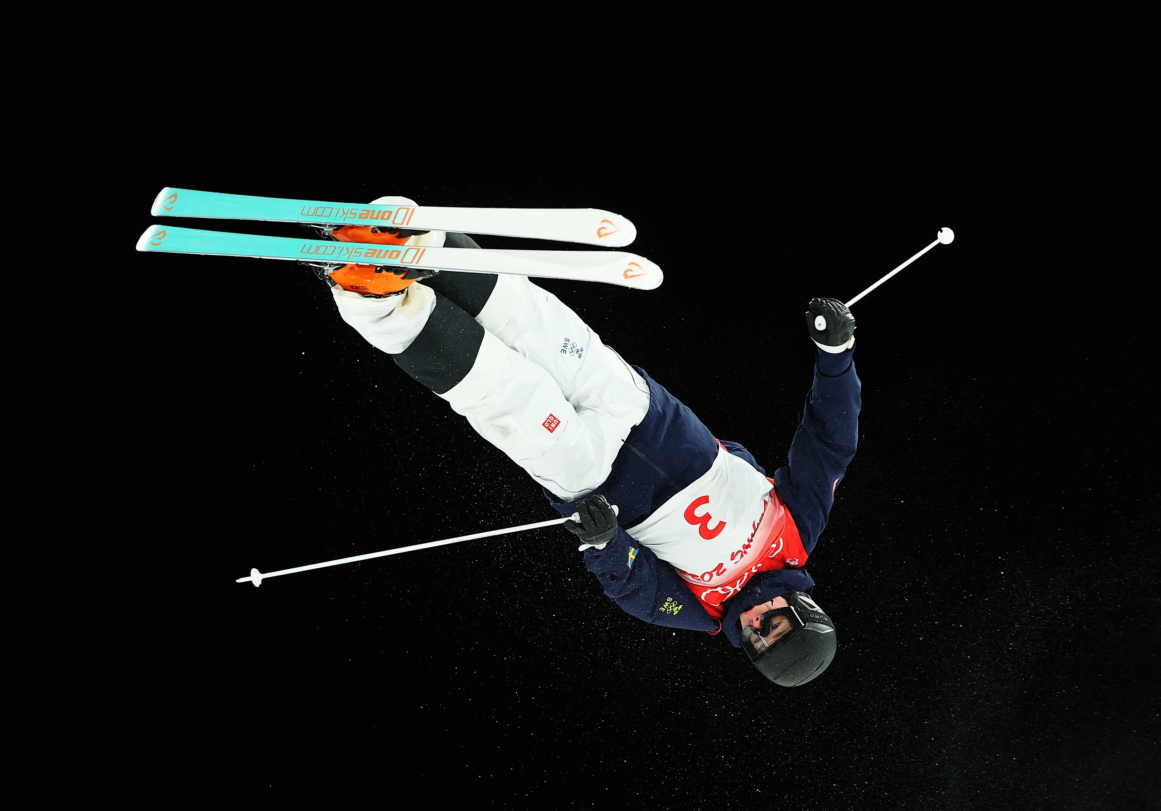 ZHANGJIAKOU, CHINA - FEBRUARY 05: Walter Wallberg of Team Sweden performs a trick during the Men's Freestyle Skiing Moguls Final on Day 1 of the Beijing 2022 Winter Olympic Games at Genting Snow Park on February 05, 2022 in Zhangjiakou, China. (Photo by Cameron Spencer/Getty Images)