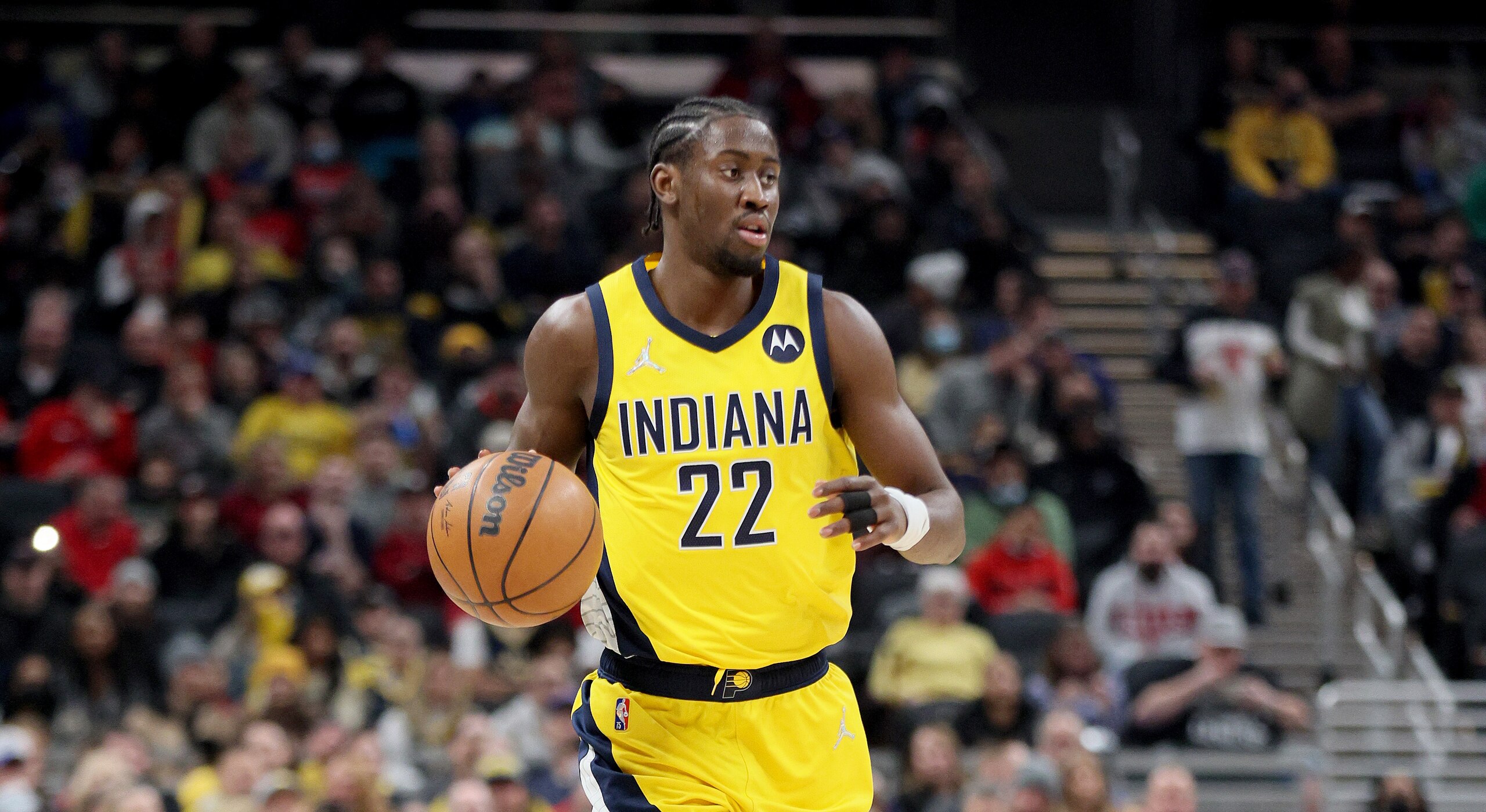 INDIANAPOLIS, INDIANA - FEBRUARY 04: Caris LeVert #22 of the Indiana Pacers dribbles the ball against the Chicago Bulls at Gainbridge Fieldhouse on February 04, 2022 in Indianapolis, Indiana.     NOTE TO USER: User expressly acknowledges and agrees that, by downloading and or using this Photograph, user is consenting to the terms and conditions of the Getty Images License Agreement.  (Photo by Andy Lyons/Getty Images)