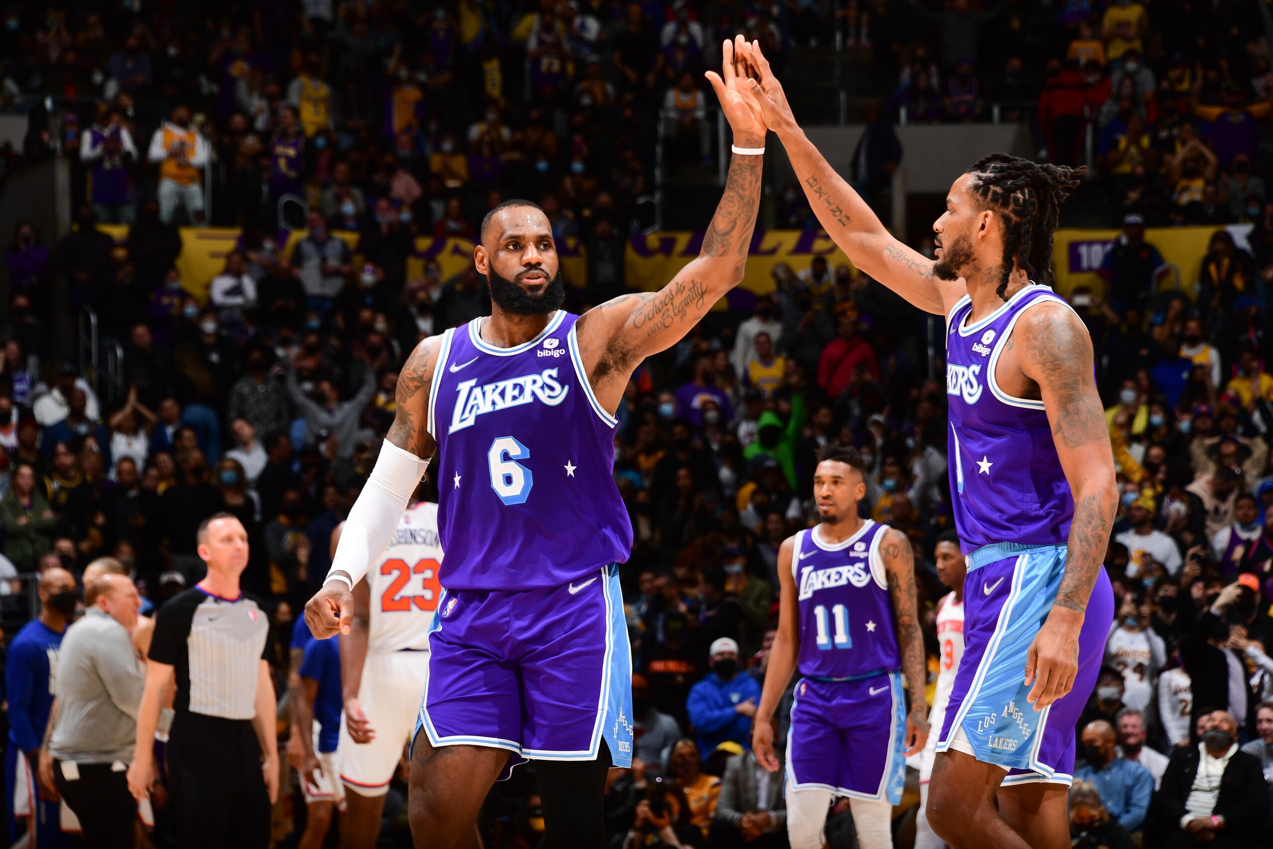 LOS ANGELES, CA - FEBRUARY 5: LeBron James #6 of the Los Angeles Lakers high fives Trevor Ariza #1 of the Los Angeles Lakers during the game against the New York Knicks on February 5, 2022 at Crypto.Com Arena in Los Angeles, California. NOTE TO USER: User expressly acknowledges and agrees that, by downloading and/or using this Photograph, user is consenting to the terms and conditions of the Getty Images License Agreement. Mandatory Copyright Notice: Copyright 2022 NBAE (Photo by Adam Pantozzi/NBAE via Getty Images)