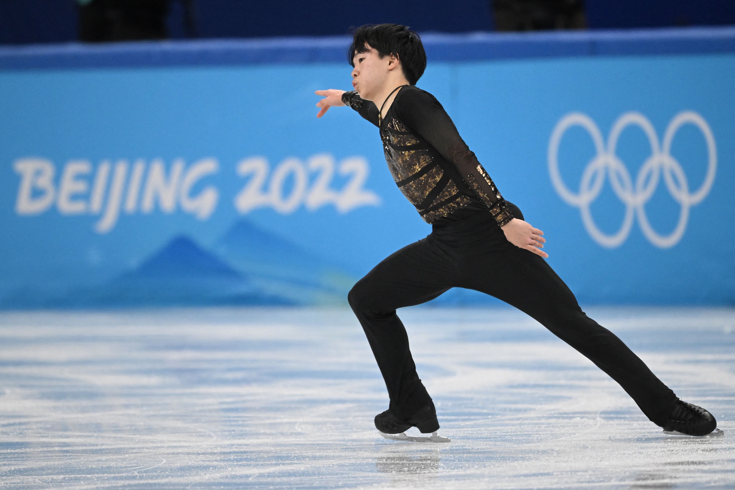 Japan's Yuma Kagiyama competes in the men's single skating free skating of the figure skating team event during the Beijing 2022 Winter Olympic Games at the Capital Indoor Stadium in Beijing on February 6, 2022. (Photo by Anne-Christine POUJOULAT / AFP) (Photo by ANNE-CHRISTINE POUJOULAT/AFP via Getty Images)