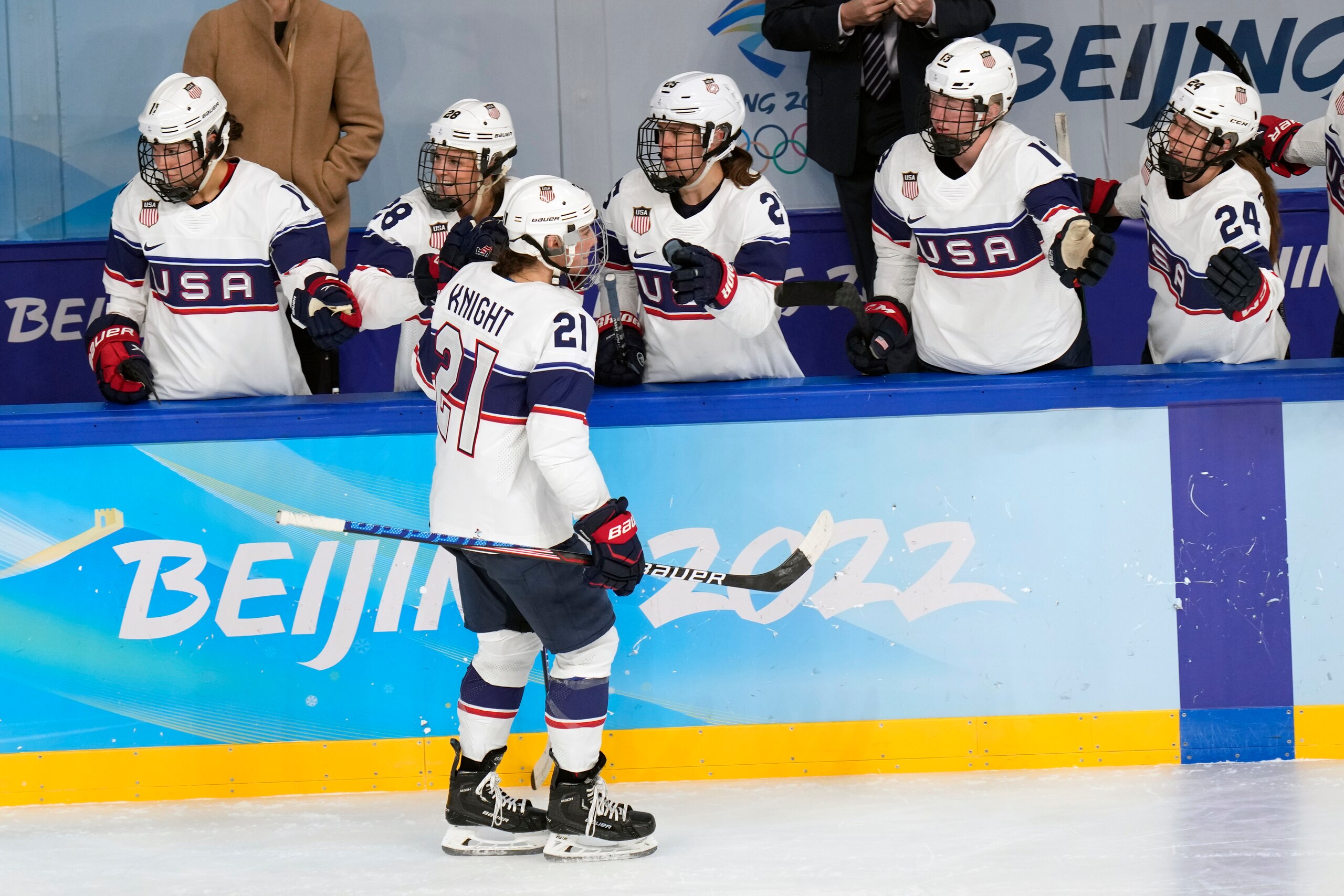 United States' Hilary Knight (21) is congratulated after scoring a goal against Switzerland during a preliminary round women's hockey game at the 2022 Winter Olympics, Sunday, Feb. 6, 2022, in Beijing. (AP Photo/Petr David Josek)
