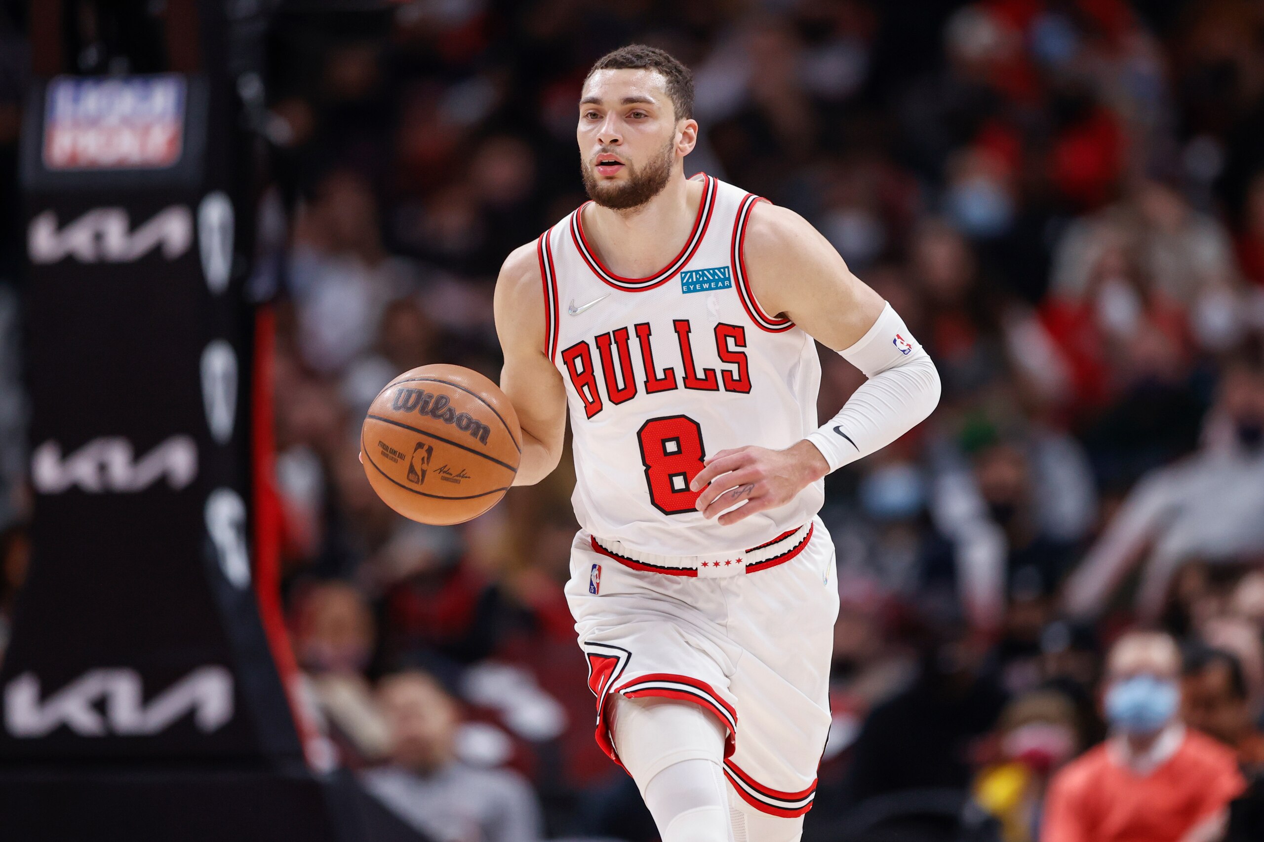 Chicago Bulls guard Zach LaVine brings the ball up court against the Orlando Magic during the first half of an NBA basketball game, Tuesday, Feb. 1, 2022, in Chicago. (AP Photo/Kamil Krzaczynski)