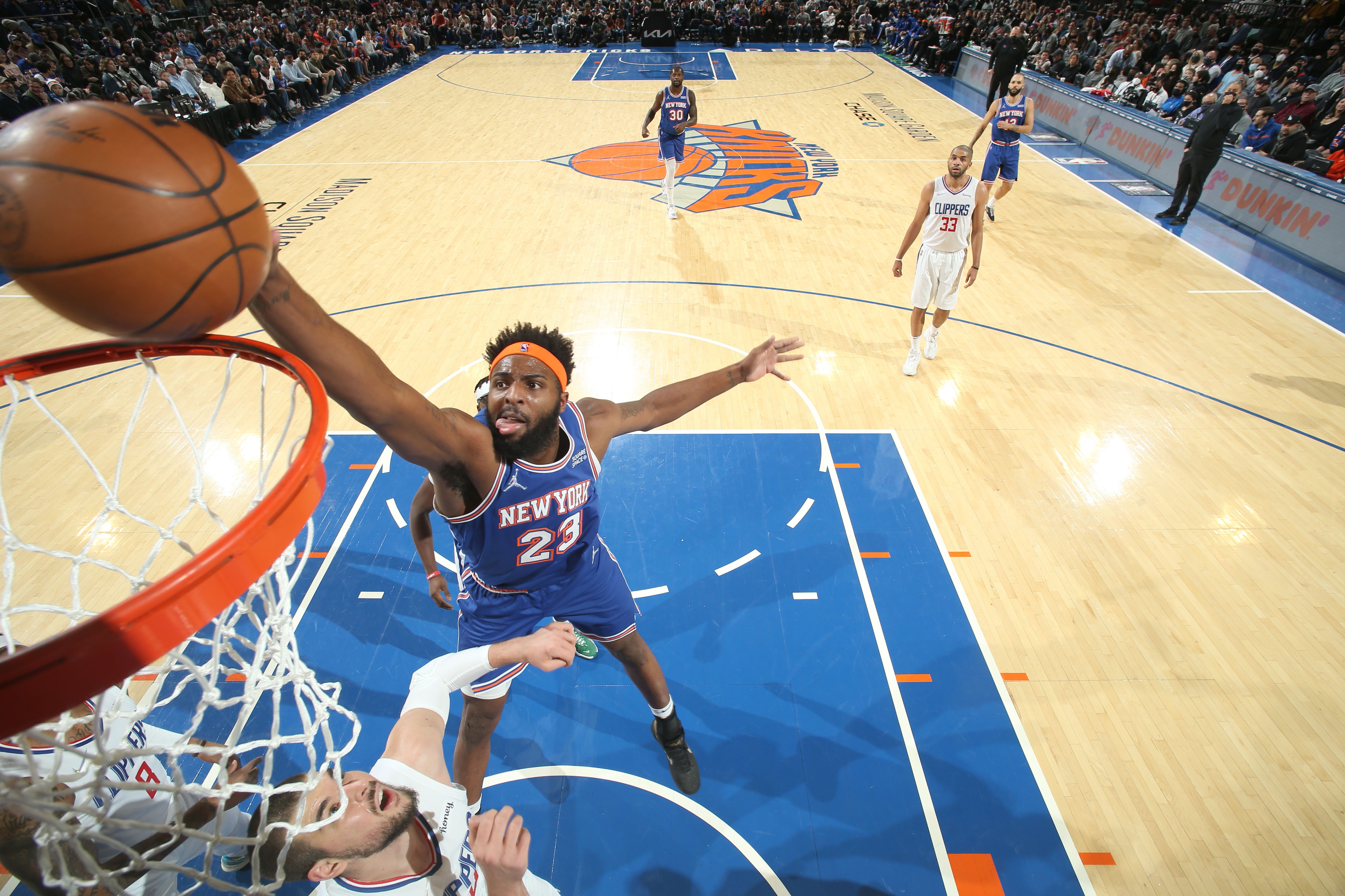 NEW YORK, NY - JANUARY 23: Mitchell Robinson #23 of the New York Knicks dunks the ball during the game against the LA Clippers on January 23, 2022 at Madison Square Garden in New York City, New York.  NOTE TO USER: User expressly acknowledges and agrees that, by downloading and or using this photograph, User is consenting to the terms and conditions of the Getty Images License Agreement. Mandatory Copyright Notice: Copyright 2022 NBAE  (Photo by Nathaniel S. Butler/NBAE via Getty Images)