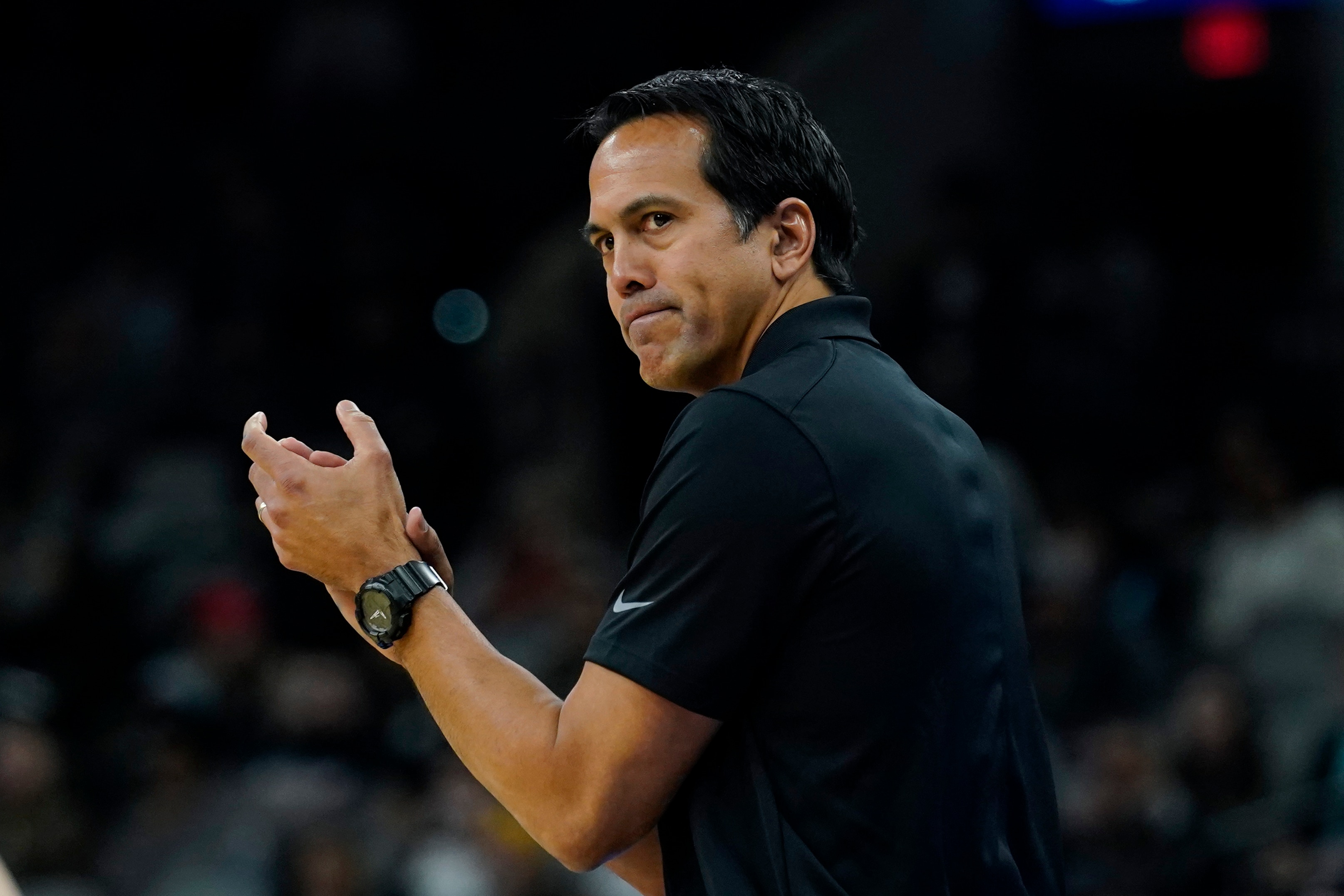 Miami Heat head coach Erik Spoelstra talks to his players during the first half of an NBA basketball game against the San Antonio Spurs, Thursday, Feb. 3, 2022, in San Antonio. (AP Photo/Eric Gay)