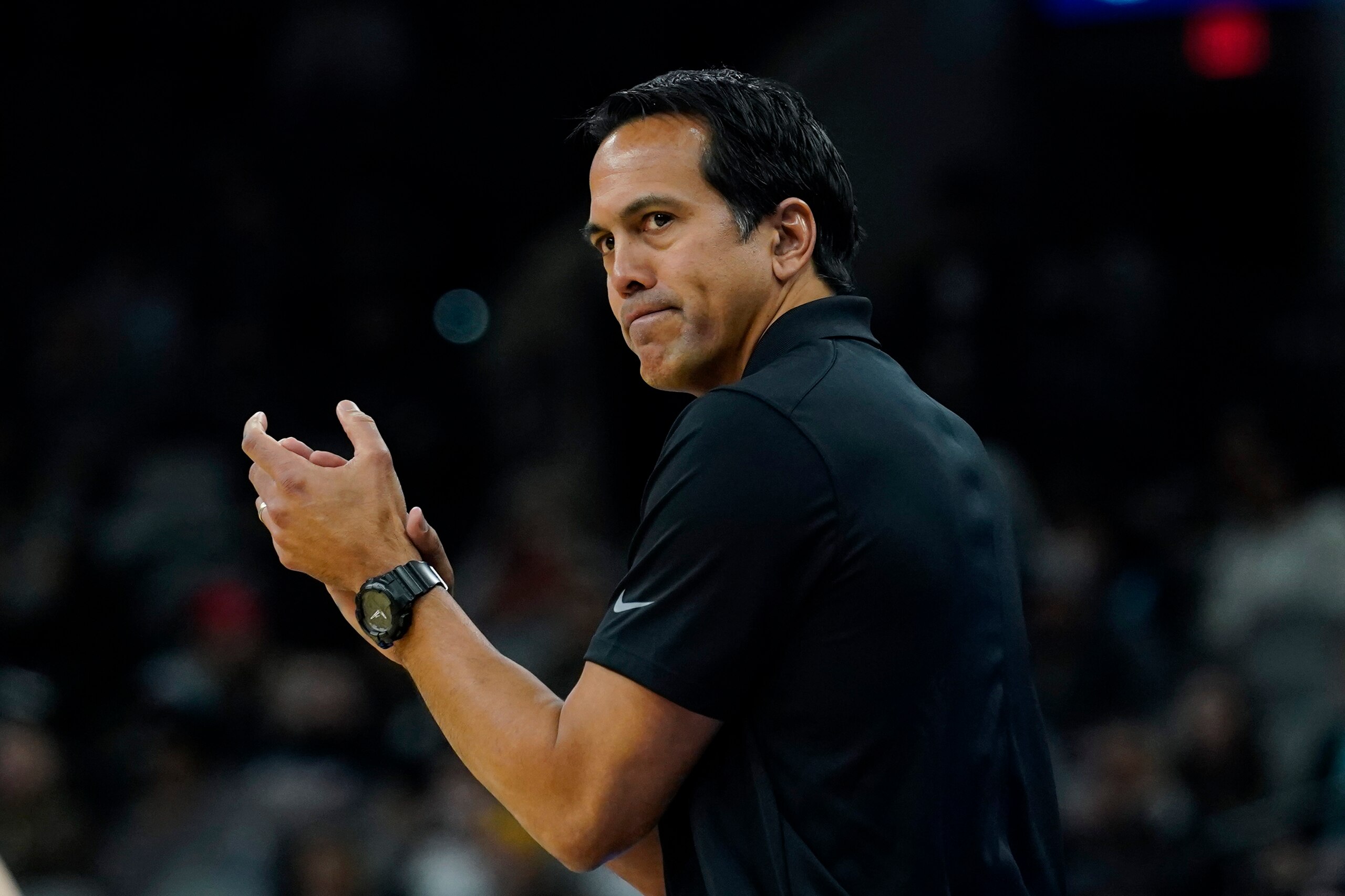 Miami Heat head coach Erik Spoelstra talks to his players during the first half of an NBA basketball game against the San Antonio Spurs, Thursday, Feb. 3, 2022, in San Antonio. (AP Photo/Eric Gay)
