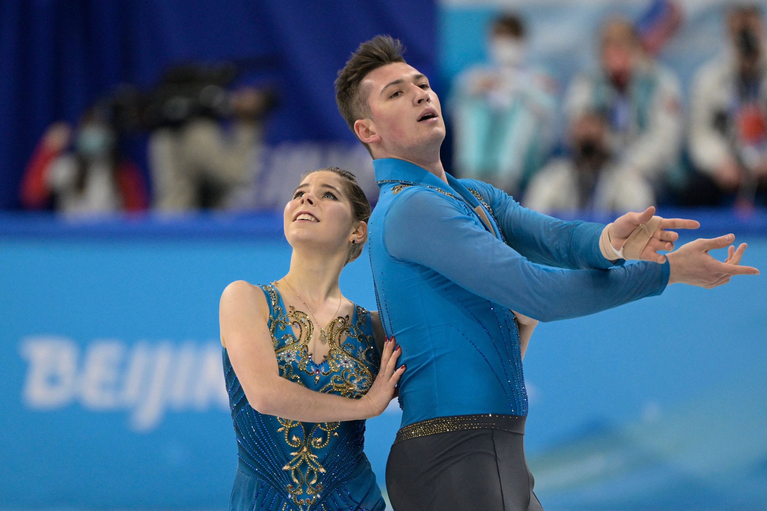 Russia's Anastasia Mishina and Aleksandr Galliamov compete in the pair skating free skating of the figure skating team event during the Beijing 2022 Winter Olympic Games at the Capital Indoor Stadium in Beijing on February 7, 2022. (Photo by SEBASTIEN BOZON / AFP) (Photo by SEBASTIEN BOZON/AFP via Getty Images)
