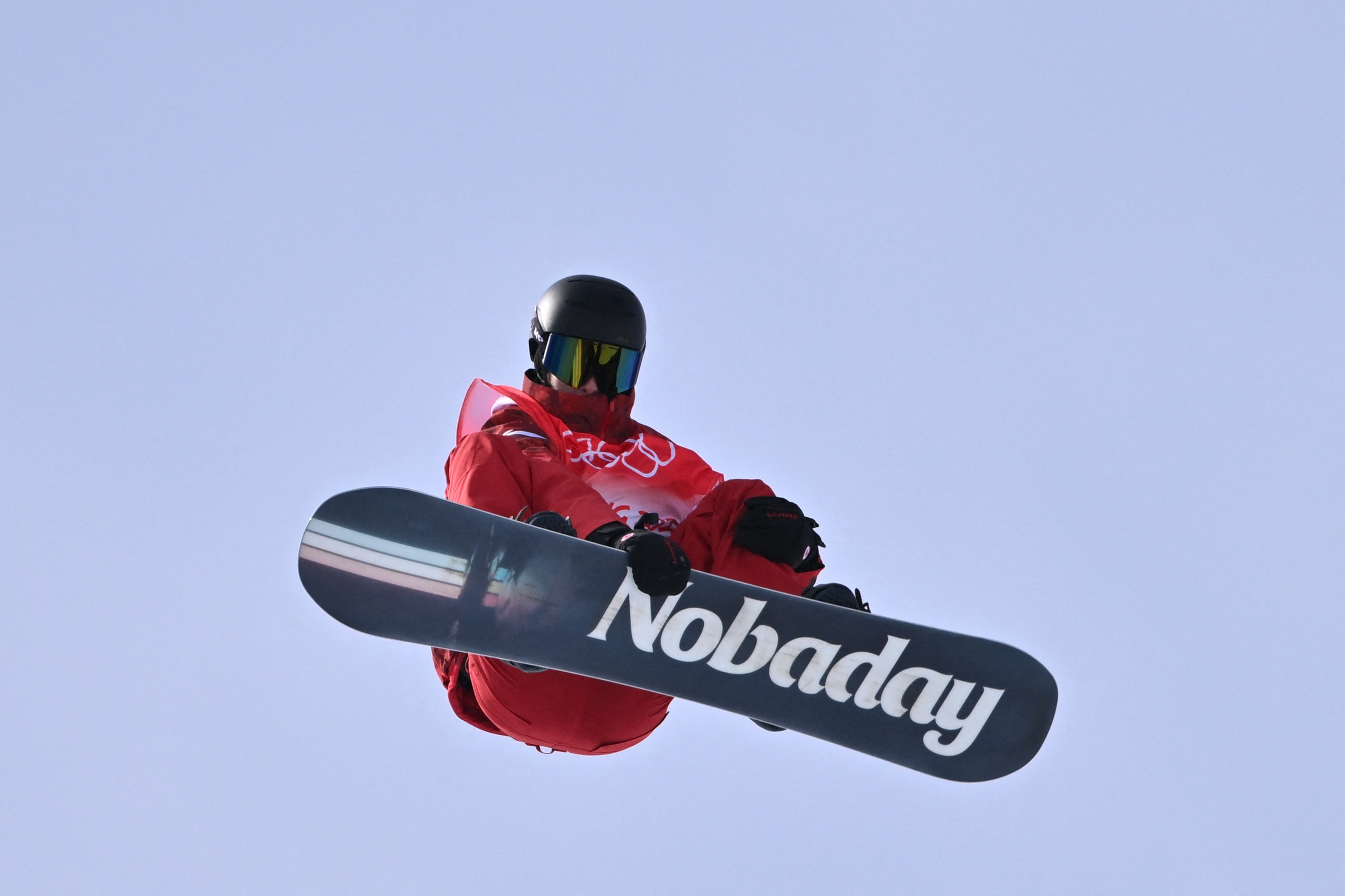 Canada's Max Parrot competes in the snowboard men's slopestyle final run during the Beijing 2022 Winter Olympic Games at the Genting Snow Park H & S Stadium in Zhangjiakou on February 7, 2022. (Photo by Ben STANSALL / AFP) (Photo by BEN STANSALL/AFP via Getty Images)