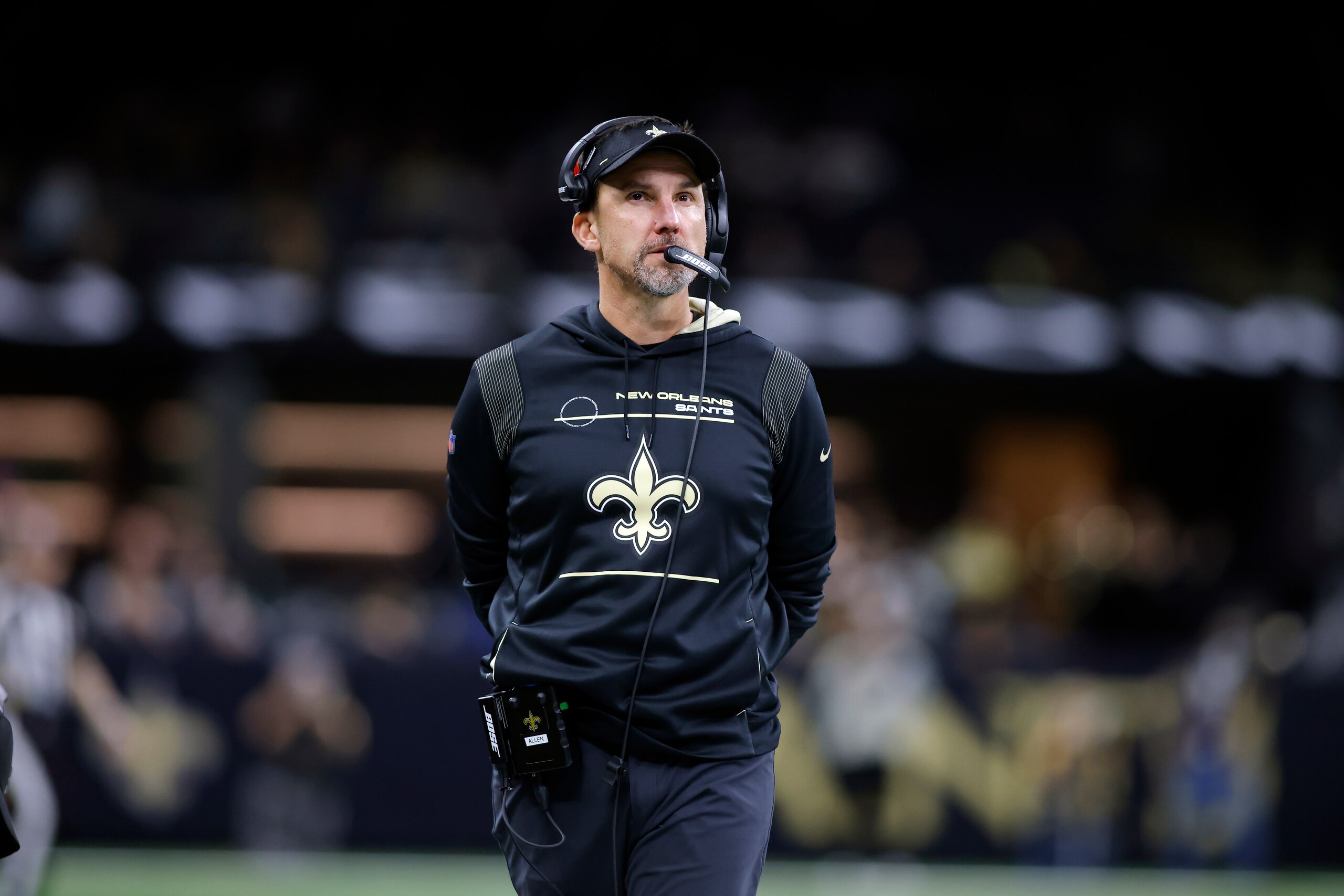 New Orleans Saints defensive coach Dennis Allen is seen during an NFL football game against the Carolina Panthers, Sunday, Jan. 2, 2022, in New Orleans. (AP Photo/Tyler Kaufman) New Orleans Saints defensive coach Dennis Allen is seen during an NFL football game against the Carolina Panthers, Sunday, Jan. 2, 2022, in New Orleans. (AP Photo/Tyler Kaufman)