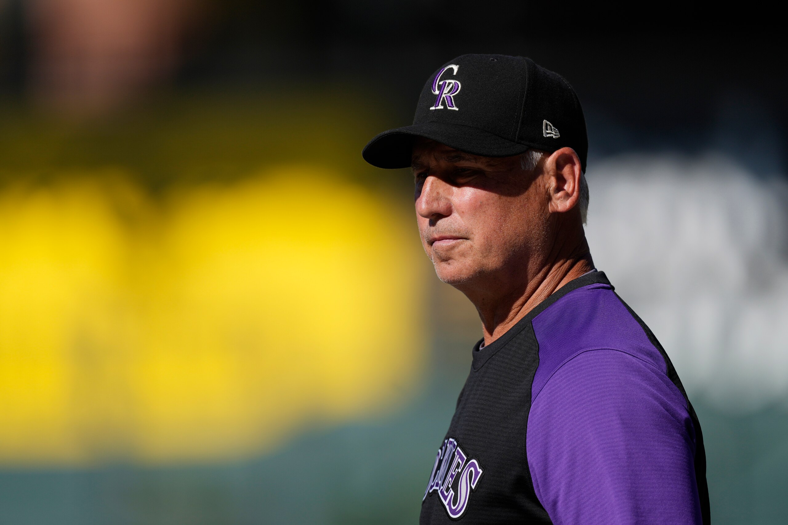 Colorado Rockies manager Bud Black looks on as players warm up before the Rockies host the San Francisco Giants in a baseball game Saturday, Sept. 25, 2021, in Denver. (AP Photo/David Zalubowski)