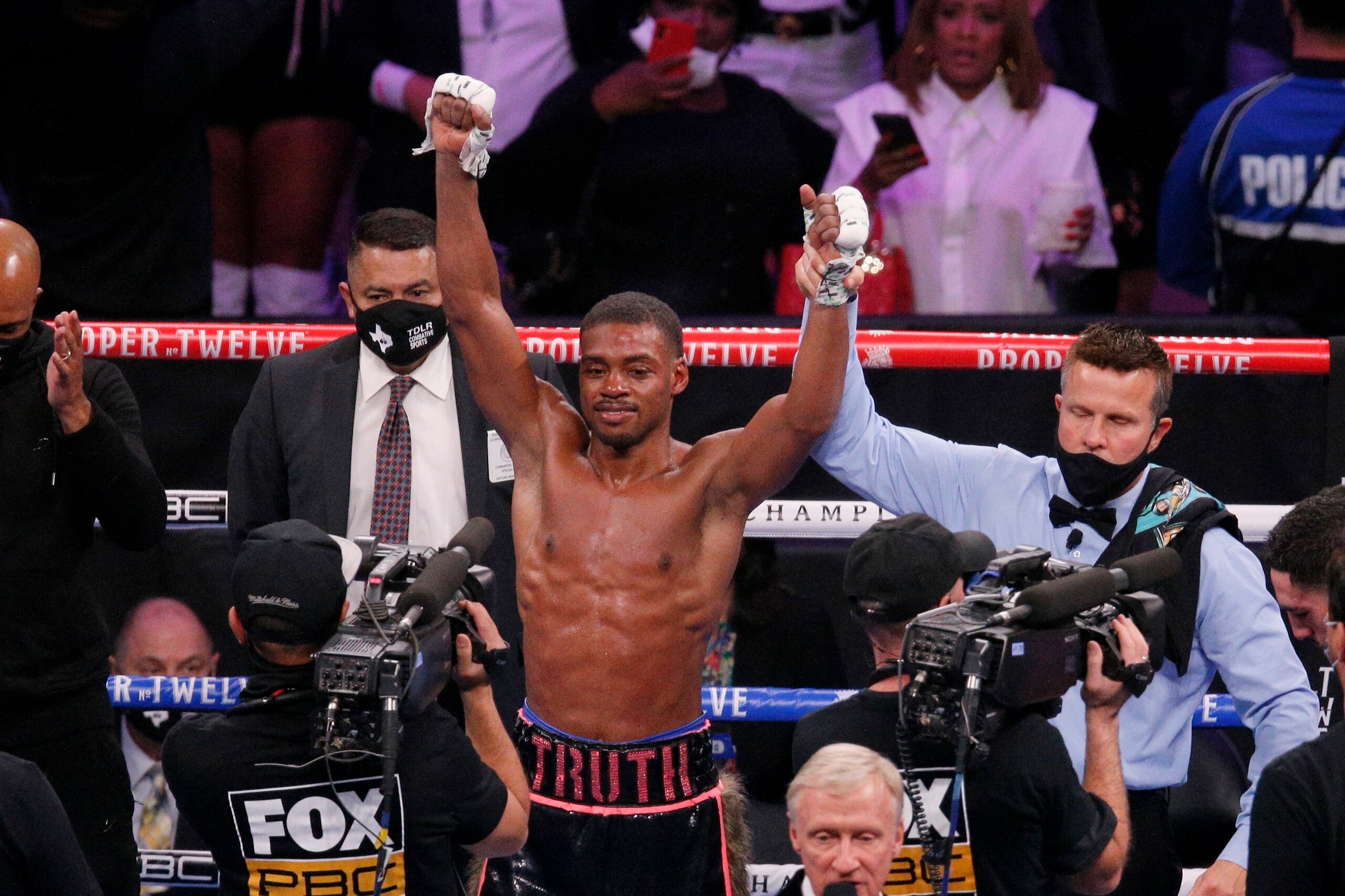 Errol Spence Jr. celebrates after defeating Danny Garcia by unanimous decision in the WBC-IBF welterweight boxing bout in Arlington, Texas, Saturday, Dec. 5, 2020. (AP Photo/Brandon Wade)