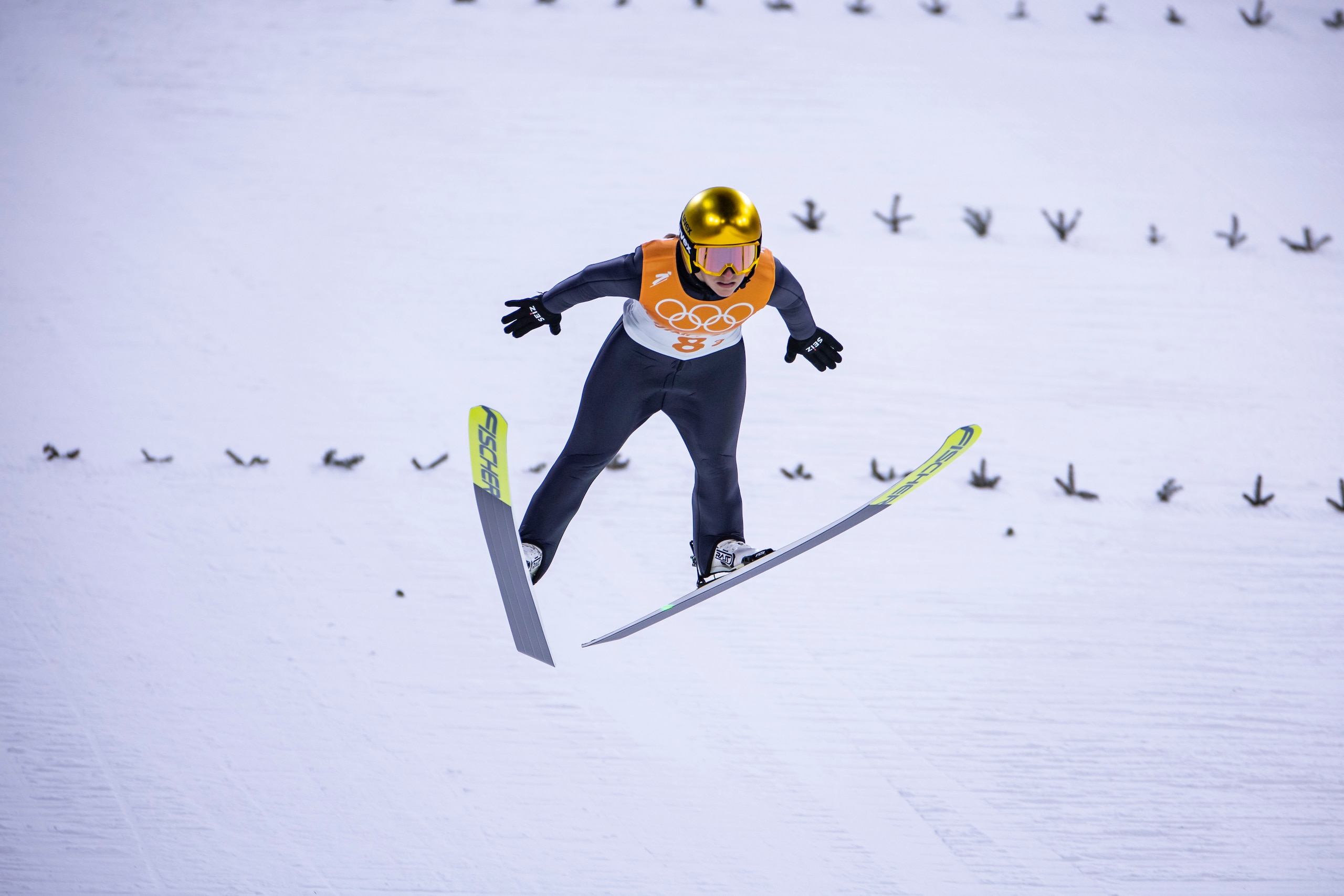 ZHANGJIAKOU, CHINA - FEBRUARY 07: Katharina Althaus of Germany in action competes during the ski jumping mixed relay during the Beijing 2022 Winter Olympics at National Ski Jumping Centre on February 7, 2022 in Zhangjiakou, China. (Photo by Tom Weller/VOIGT/DeFodi Images via Getty Images)