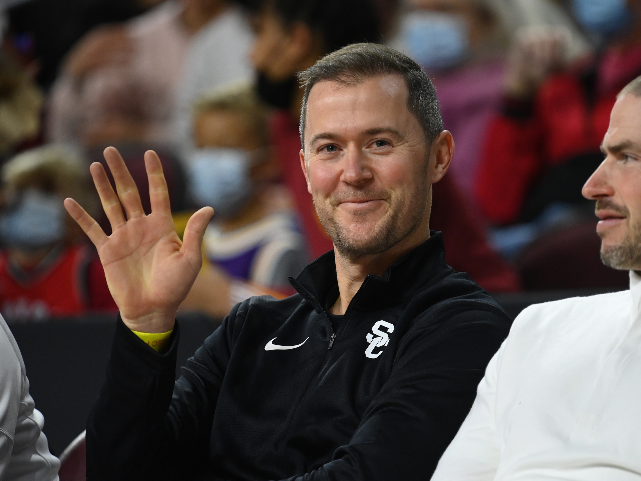 LOS ANGELES, CA - DECEMBER 12: USC Trojans head football coach Lincoln Riley attends the game between the USC Trojans and the Long Beach State 49ers at Galen Center on December 12, 2021 in Los Angeles, California. (Photo by Jayne Kamin-Oncea/Getty Images)