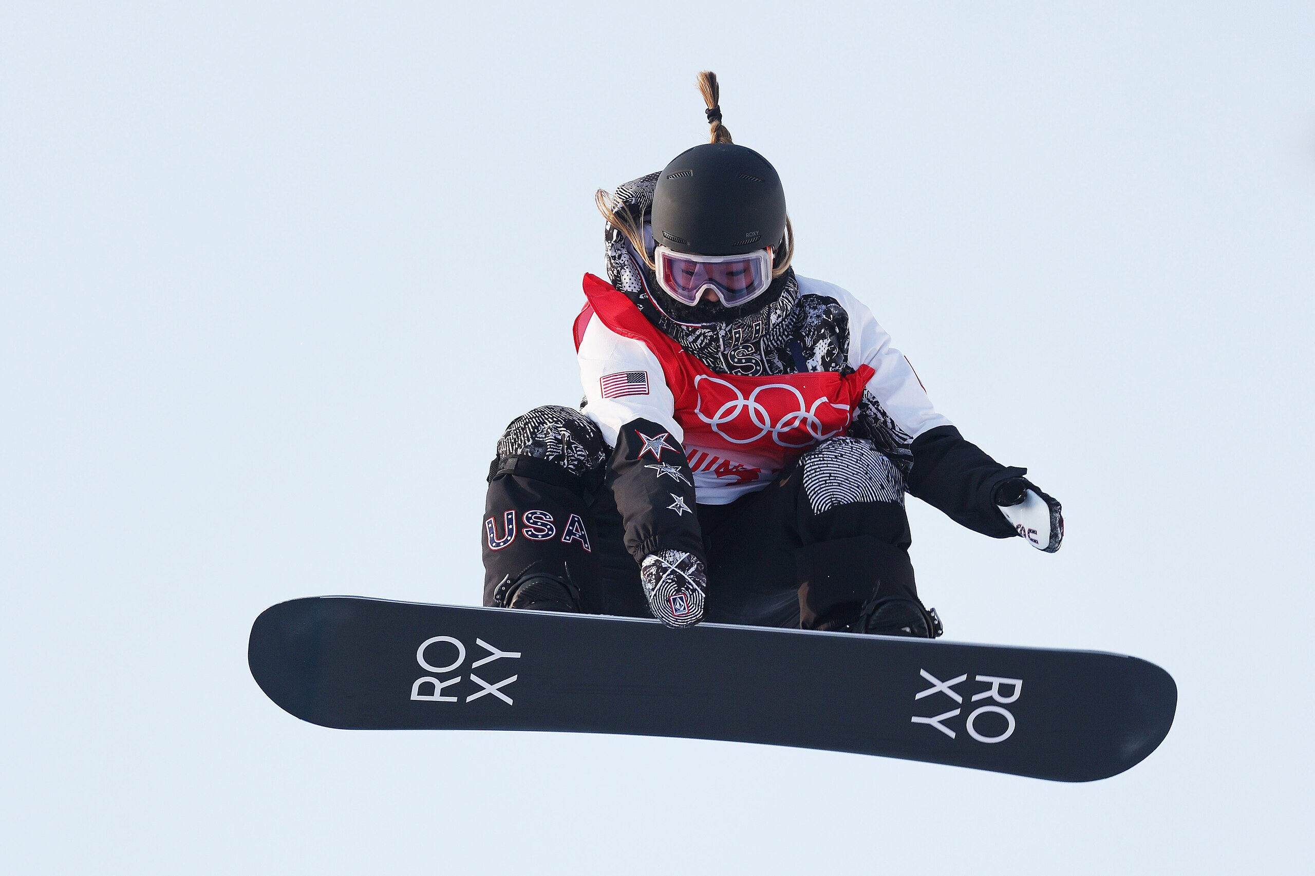 ZHANGJIAKOU, CHINA - FEBRUARY 09: Chloe Kim of United States performs a trick on a practice run during the Women's Snowboard Halfpipe Qualification on Day 5 of the Beijing 2022 Winter Olympic Games at Genting Snow Park on February 09, 2022 in Zhangjiakou, China. (Photo by Lars Baron/Getty Images)