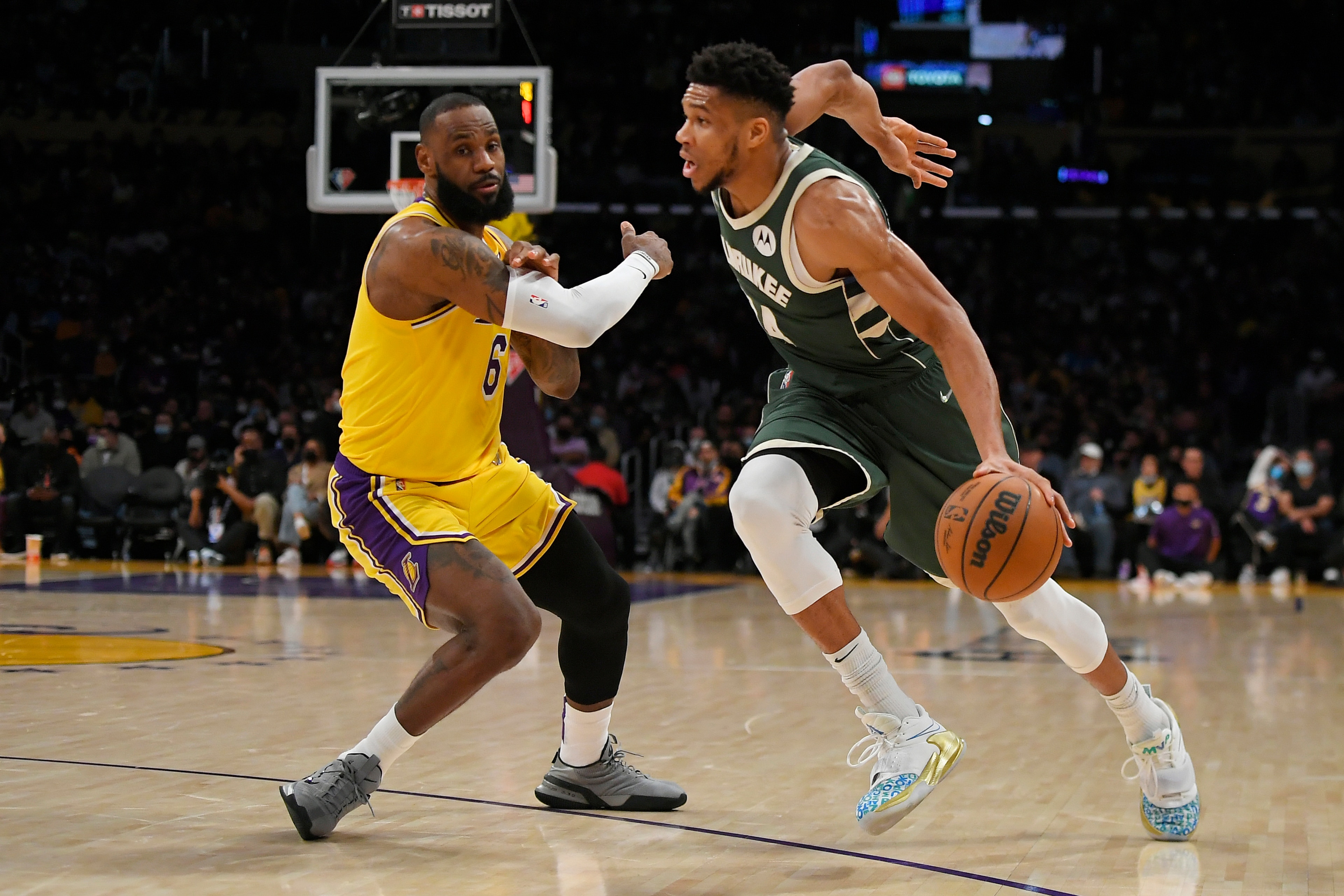 Los Angeles Lakers forward LeBron James (6) guards Milwaukee Bucks forward Giannis Antetokounmpo (34) in the first half in an NBA basketball game, Tuesday, Feb. 8, 2022, in Los Angeles. (AP Photo/John McCoy) Los Angeles Lakers forward LeBron James (6) guards Milwaukee Bucks forward Giannis Antetokounmpo (34) in the first half in an NBA basketball game, Tuesday, Feb. 8, 2022, in Los Angeles. (AP Photo/John McCoy)