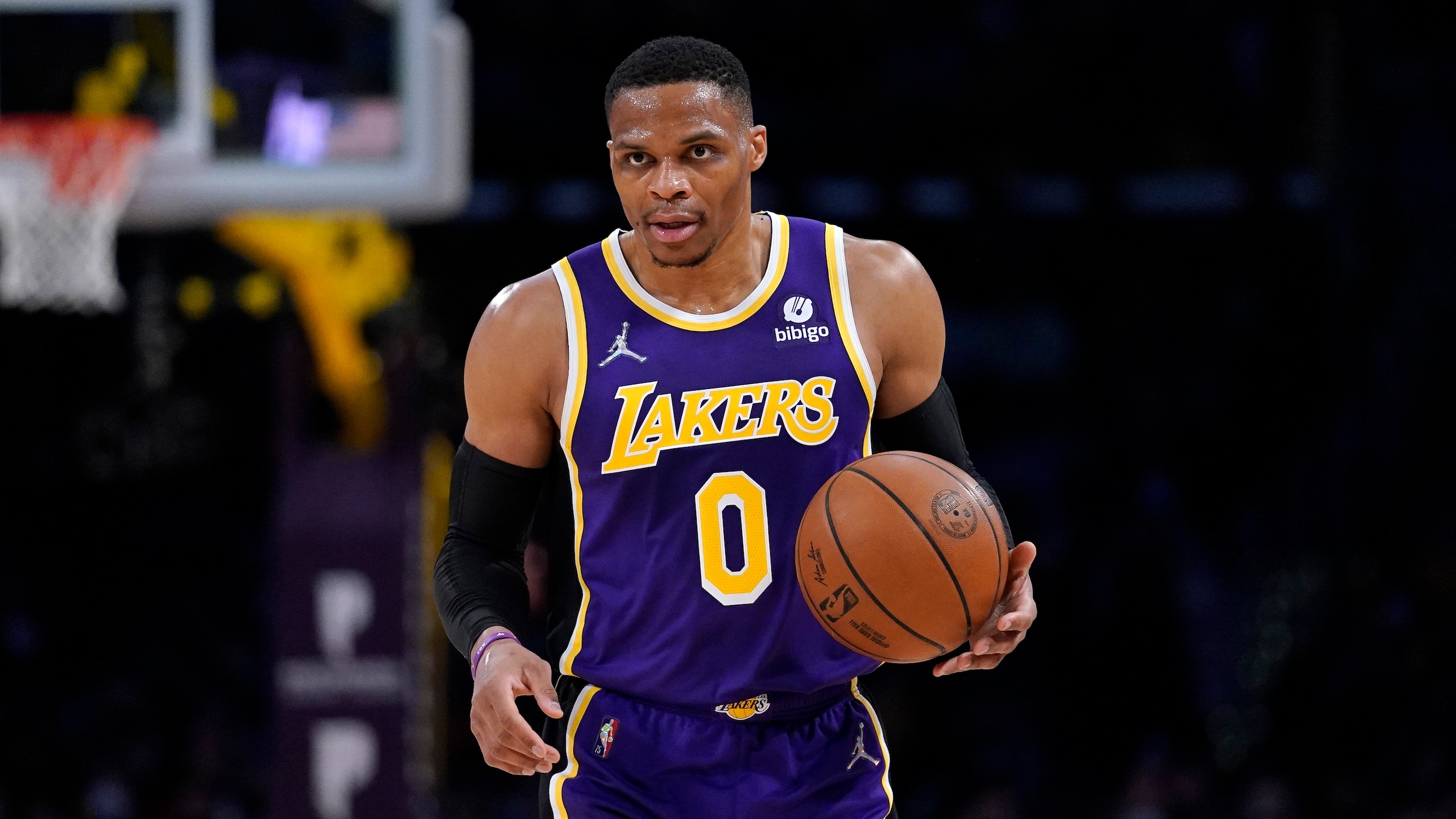 Los Angeles Lakers guard Russell Westbrook dribbles during the first half of an NBA basketball game against the Portland Trail Blazers Wednesday, Feb. 2, 2022, in Los Angeles. (AP Photo/Mark J. Terrill)