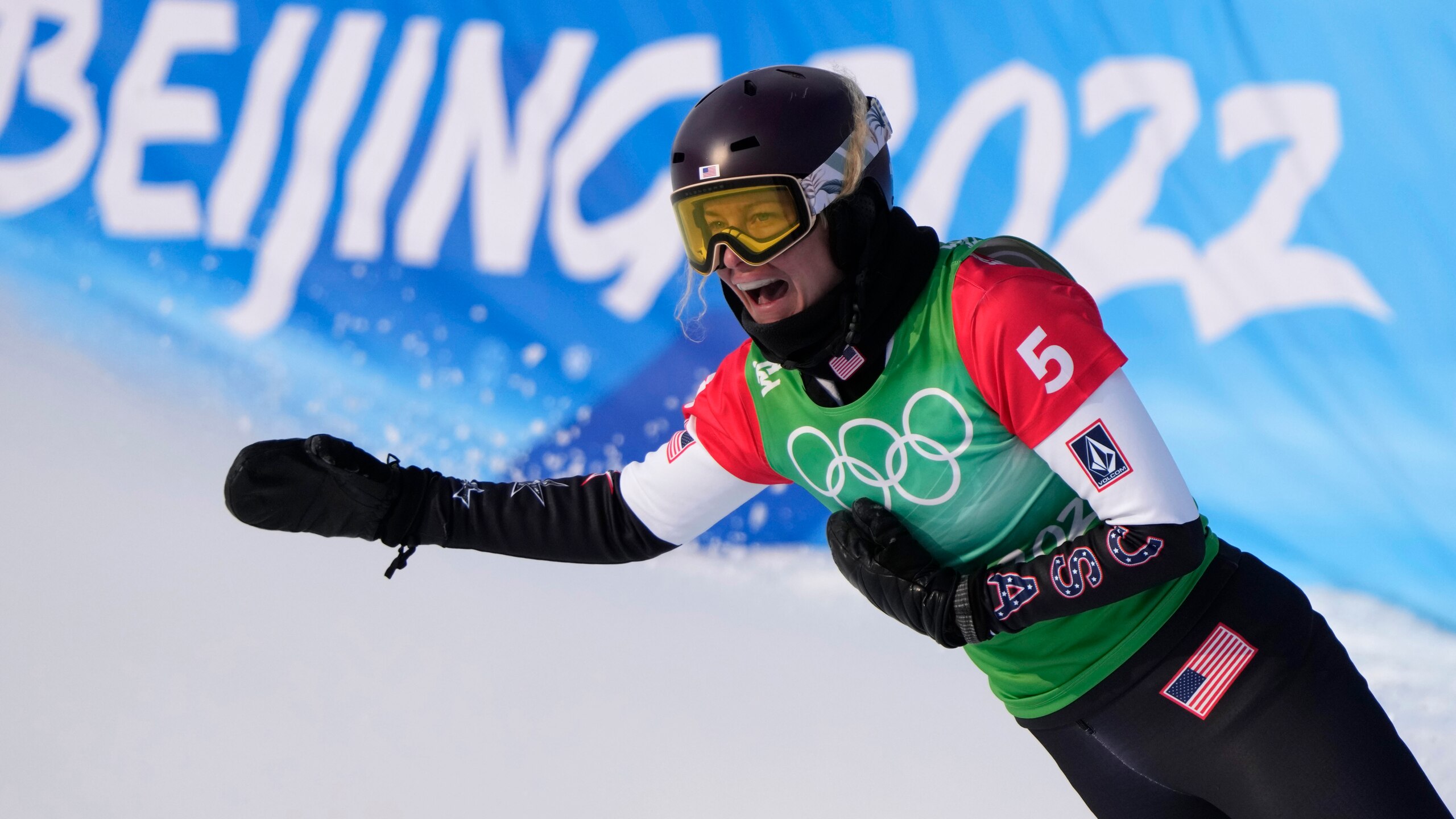 United States' Lindsey Jacobellis celebrates after winning a gold medal in the women's cross at the 2022 Winter Olympics, Wednesday, Feb. 9, 2022, in Zhangjiakou, China. (AP Photo/Lee Jin-man)