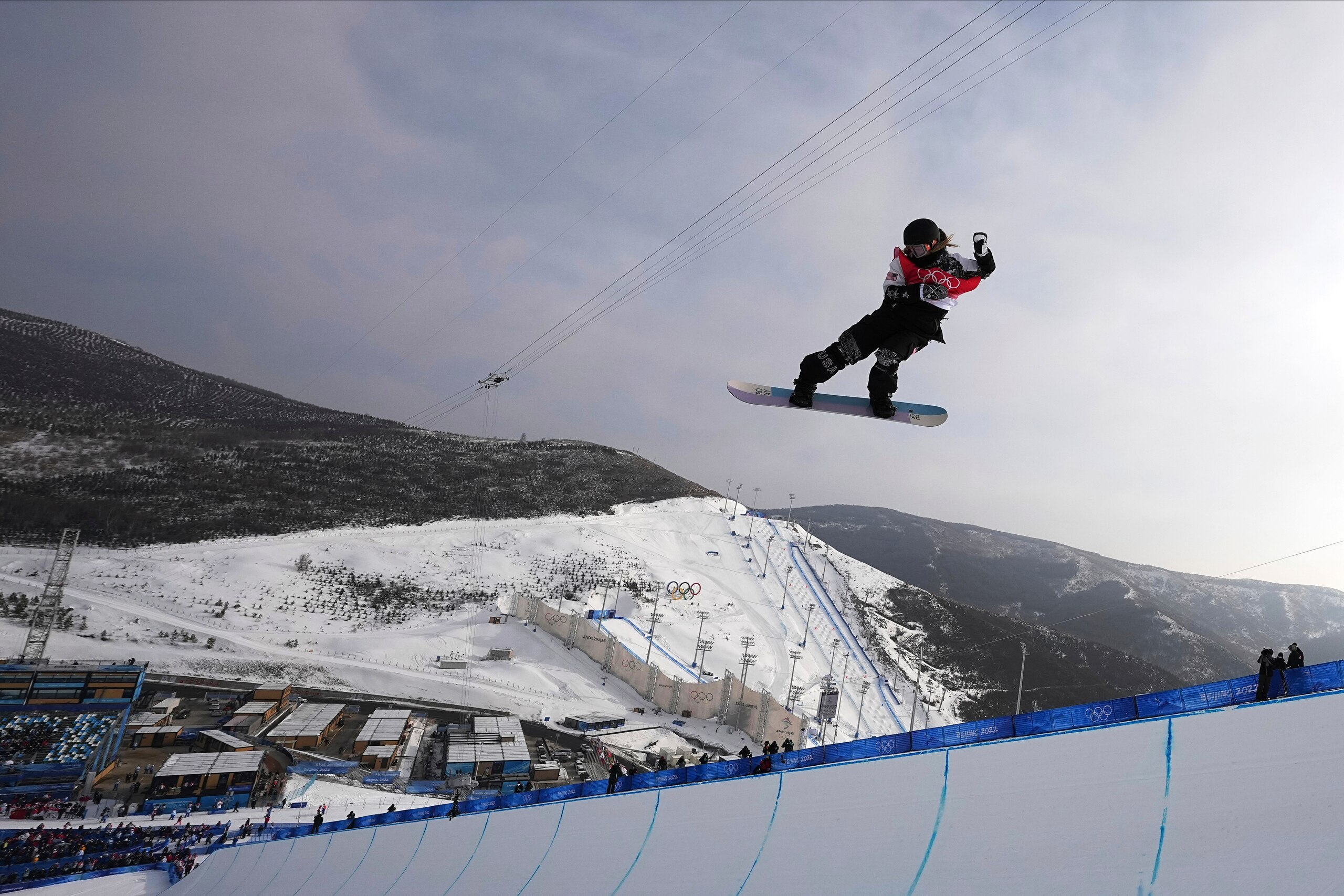 United States' Chloe Kim competes during the women's halfpipe finals at the 2022 Winter Olympics, Thursday, Feb. 10, 2022, in Zhangjiakou, China. (AP Photo/Gregory Bull)
