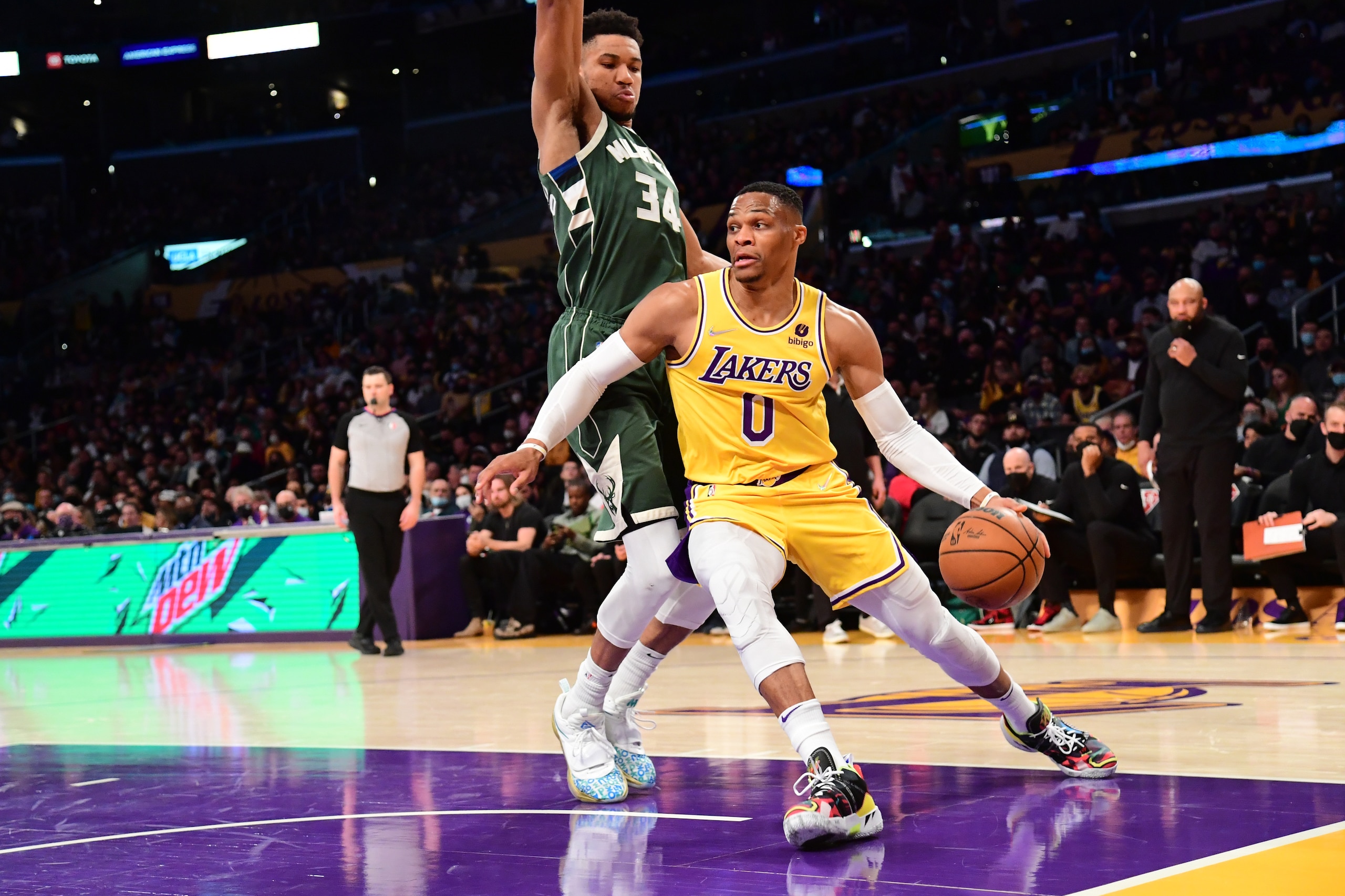 LOS ANGELES, CA - FEBRUARY 8: Russell Westbrook #0 of the Los Angeles Lakers drives to the basket during the game against the Milwaukee Bucks on February 8, 2022 at Crypto.Com Arena in Los Angeles, California. NOTE TO USER: User expressly acknowledges and agrees that, by downloading and/or using this Photograph, user is consenting to the terms and conditions of the Getty Images License Agreement. Mandatory Copyright Notice: Copyright 2022 NBAE (Photo by Adam Pantozzi/NBAE via Getty Images)