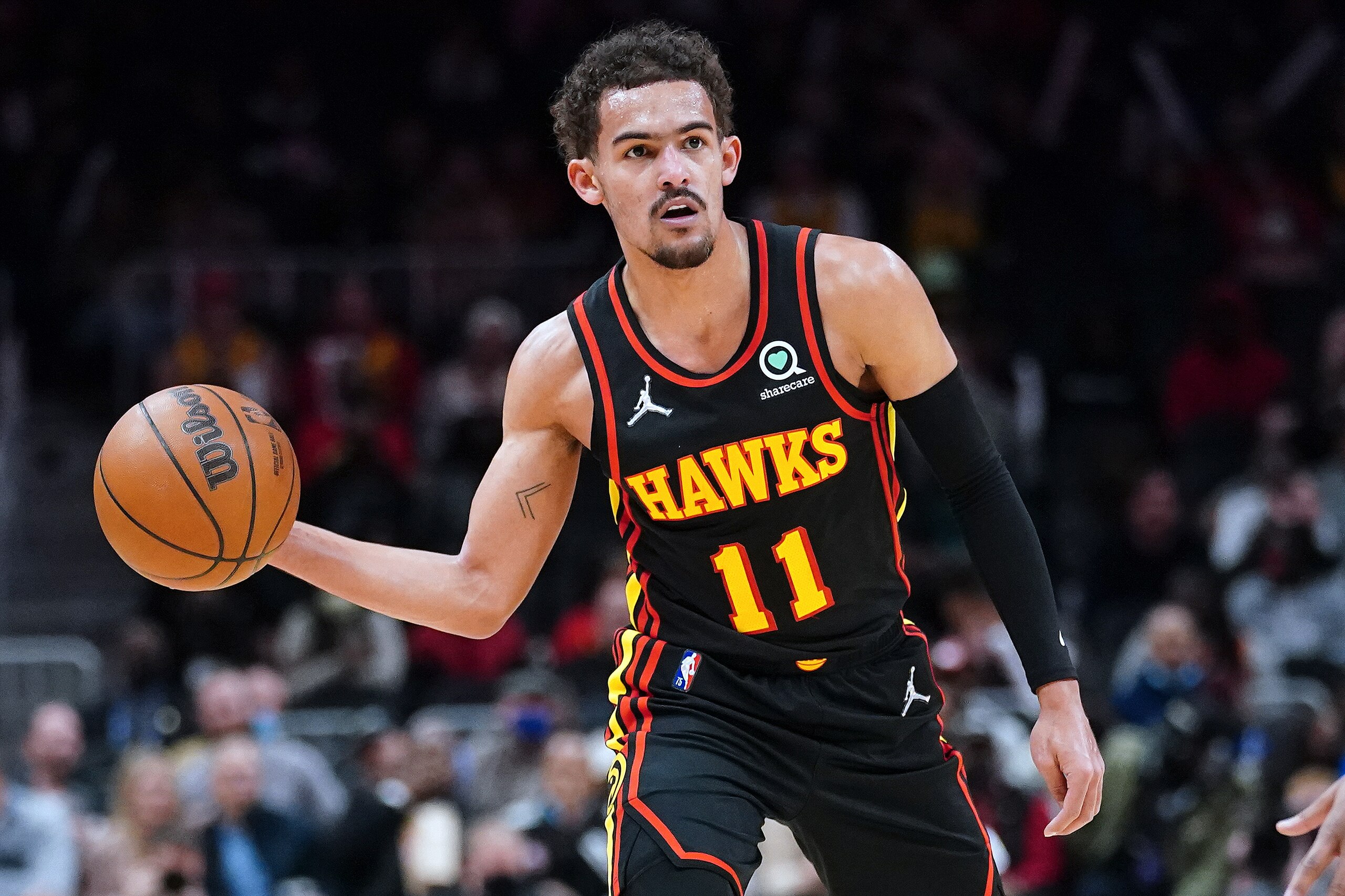 Atlanta Hawks guard Trae Young (11) is shown in action against the Indiana Pacers during the first half of an NBA basketball game Tuesday, Feb. 8, 2022, in Atlanta. (AP Photo/John Bazemore) Atlanta Hawks guard Trae Young (11) is shown in action against the Indiana Pacers during the first half of an NBA basketball game Tuesday, Feb. 8, 2022, in Atlanta. (AP Photo/John Bazemore)