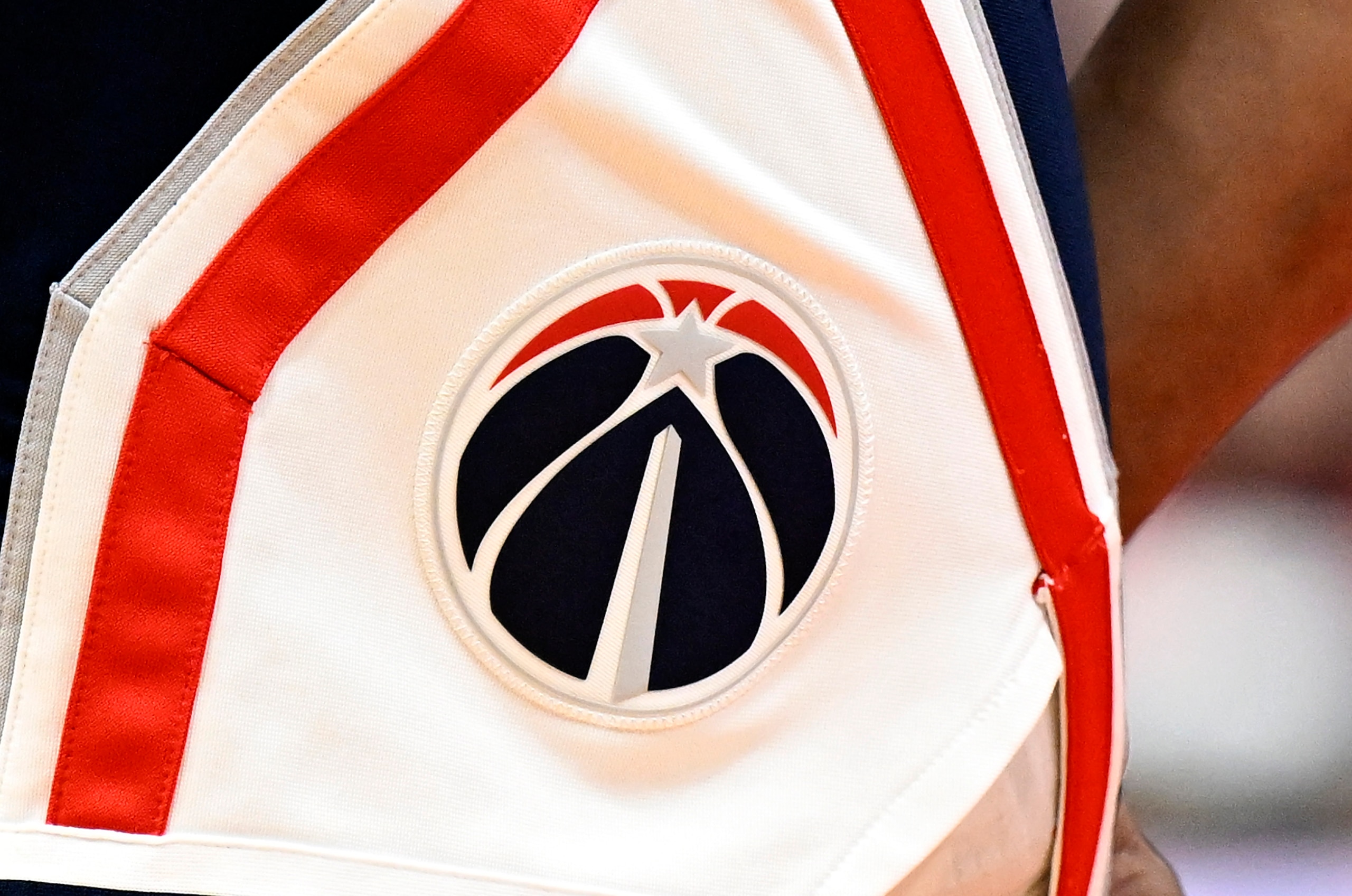 WASHINGTON, DC - JANUARY 01: The Washington Wizards logo on their uniform during the game against the Chicago Bulls at Capital One Arena on January 01, 2022 in Washington, DC.  NOTE TO USER: User expressly acknowledges and agrees that, by downloading and or using this photograph, User is consenting to the terms and conditions of the Getty Images License Agreement. (Photo by G Fiume/Getty Images)