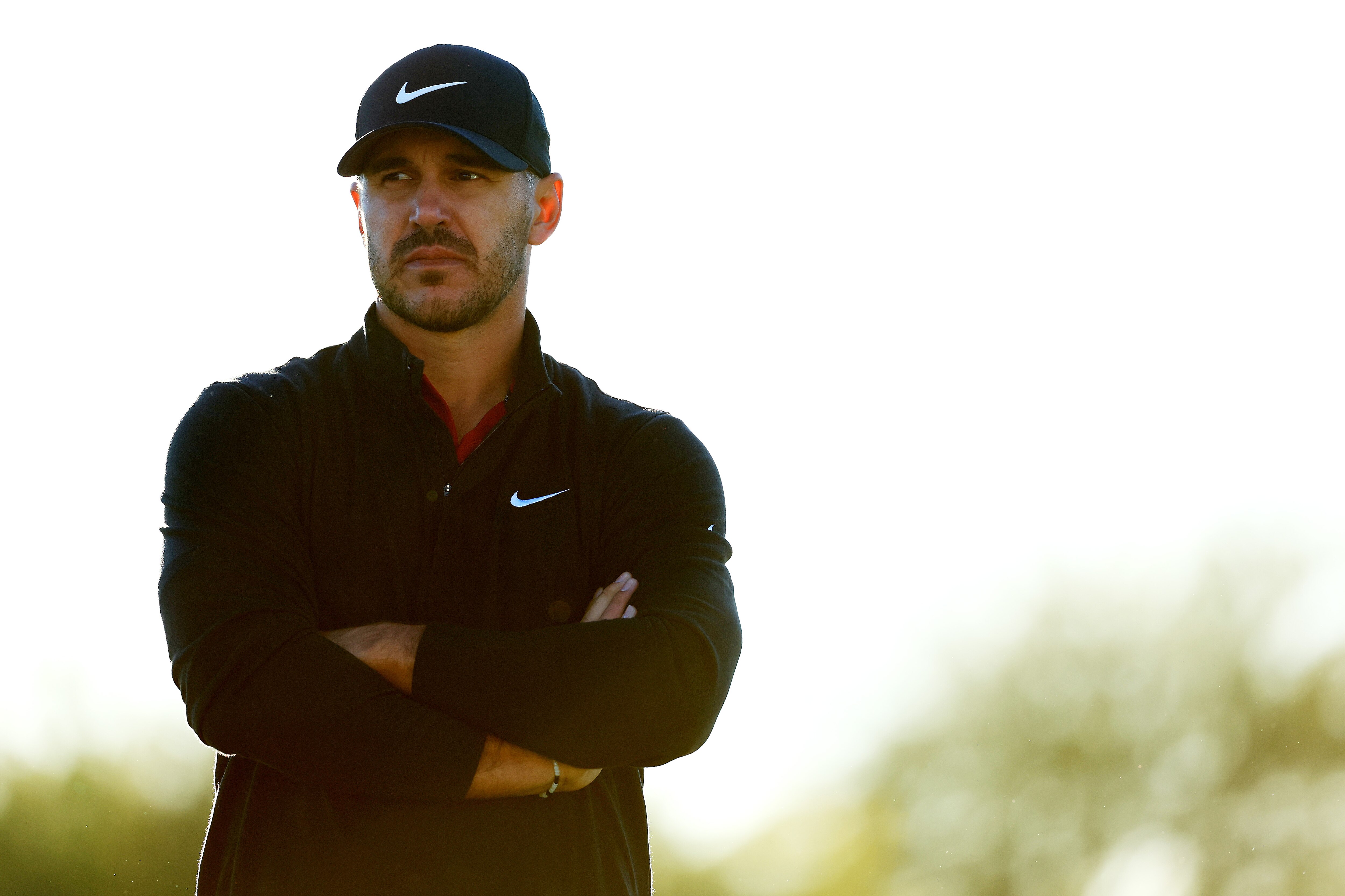 SCOTTSDALE, ARIZONA - FEBRUARY 10: Brooks Koepka stands on the 11th hole during the first round of the WM Phoenix Open at TPC Scottsdale on February 10, 2022 in Scottsdale, Arizona. (Photo by Mike Ehrmann/Getty Images)