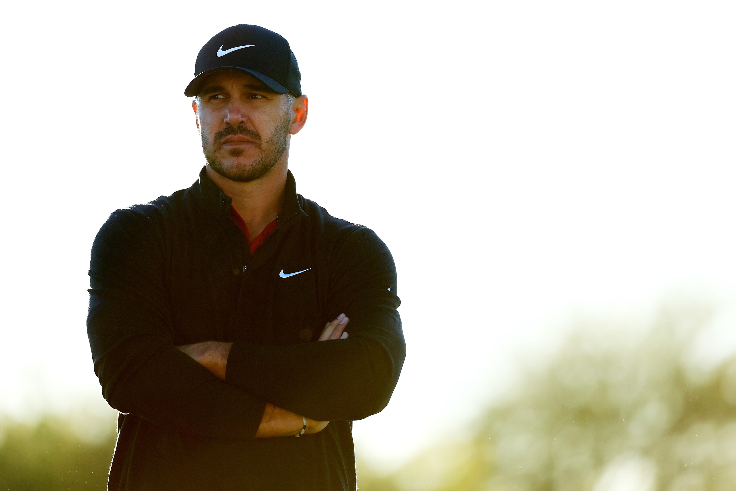 SCOTTSDALE, ARIZONA - FEBRUARY 10: Brooks Koepka stands on the 11th hole during the first round of the WM Phoenix Open at TPC Scottsdale on February 10, 2022 in Scottsdale, Arizona. (Photo by Mike Ehrmann/Getty Images)