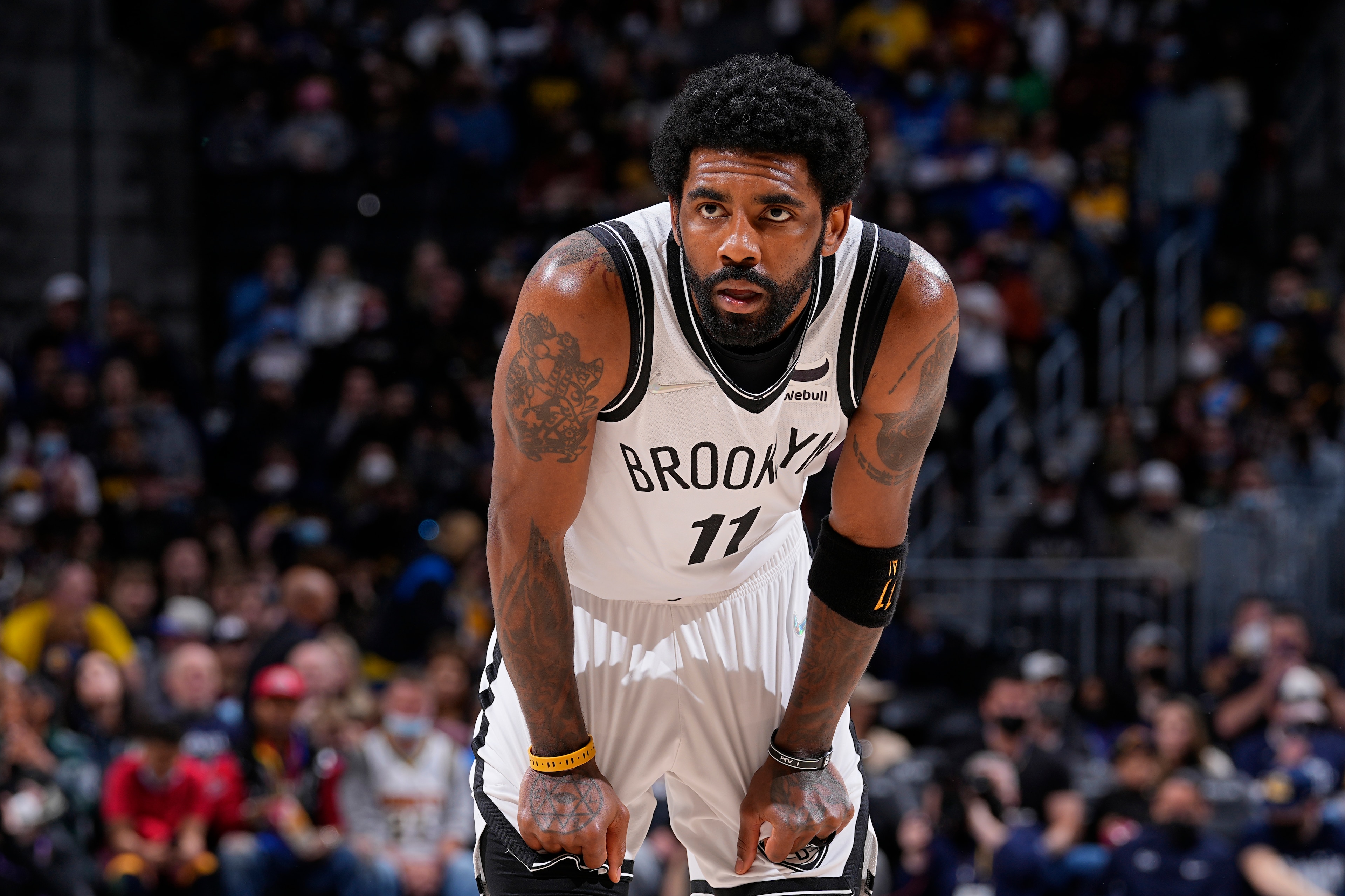 DENVER, CO - FEBRUARY 6: Kyrie Irving #11 of the Brooklyn Nets looks on during the game against the Denver Nuggets on February 6, 2022 at the Ball Arena in Denver, Colorado. NOTE TO USER: User expressly acknowledges and agrees that, by downloading and/or using this Photograph, user is consenting to the terms and conditions of the Getty Images License Agreement. Mandatory Copyright Notice: Copyright 2022 NBAE (Photo by Bart Young/NBAE via Getty Images)