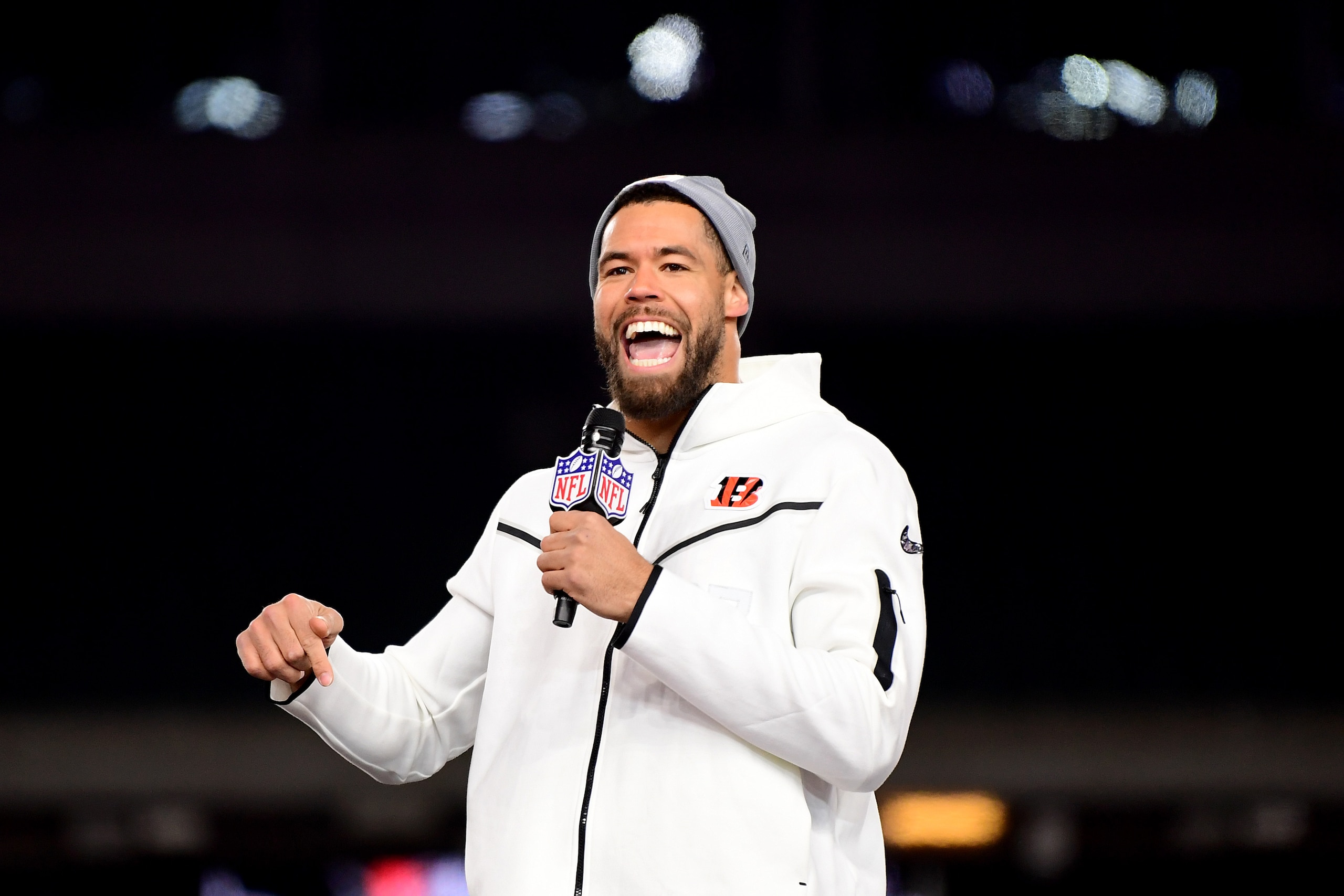 CINCINNATI, OHIO - FEBRUARY 07: C.J. Uzomah #87 of the Cincinnati Bengals speaks during a Cincinnati Bengals Fan Rally ahead of Super Bowl LVI at Paul Brown Stadium on February 07, 2022 in Cincinnati, Ohio. (Photo by Emilee Chinn/Getty Images)