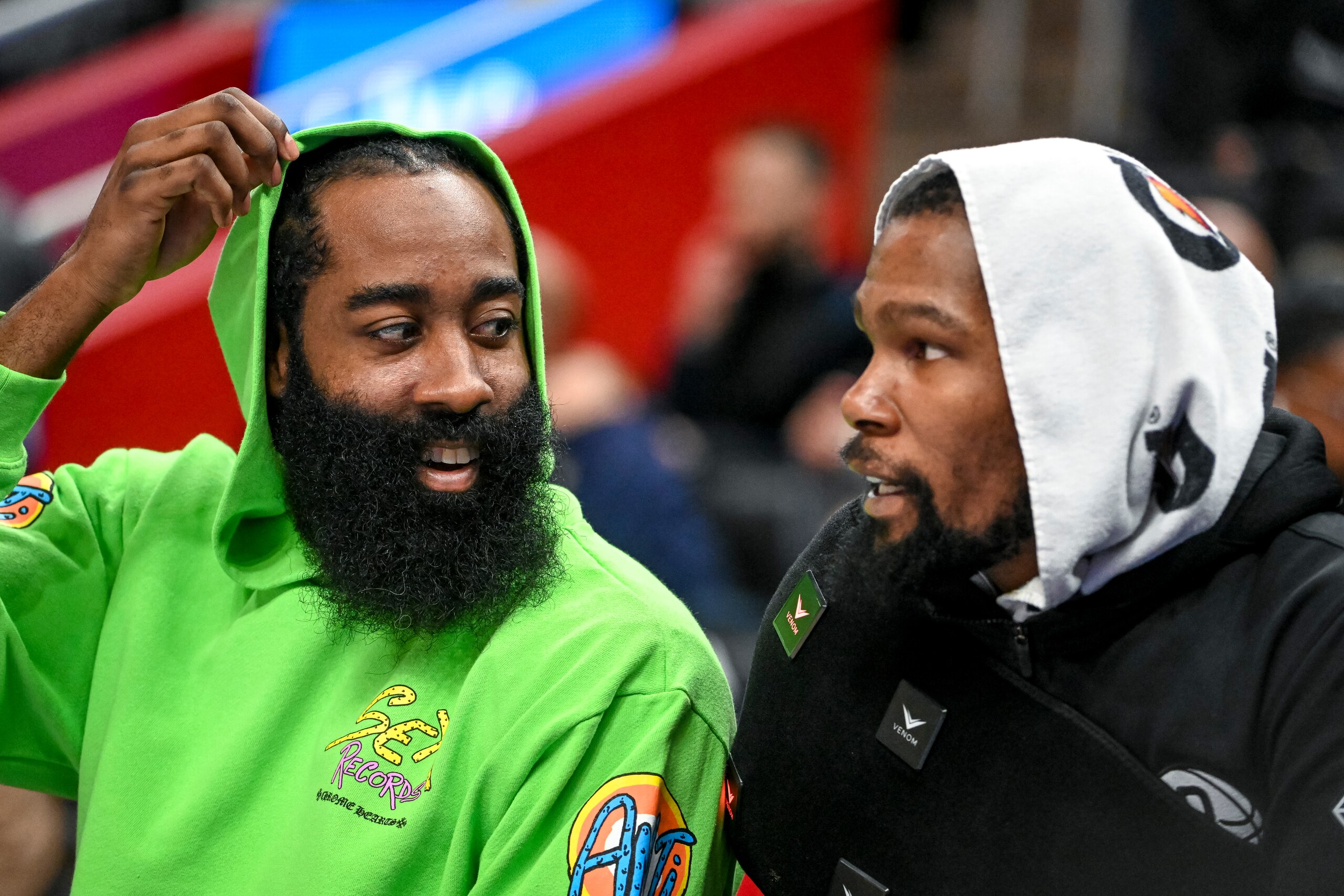 DETROIT, MICHIGAN - DECEMBER 12: James Harden #13 of the Brooklyn Nets talks with Kevin Durant #7 of the Brooklyn Nets during the second quarter against the Detroit Pistons at Little Caesars Arena on December 12, 2021 in Detroit, Michigan. NOTE TO USER: User expressly acknowledges and agrees that, by downloading and or using this photograph, User is consenting to the terms and conditions of the Getty Images License Agreement. (Photo by Nic Antaya/Getty Images)