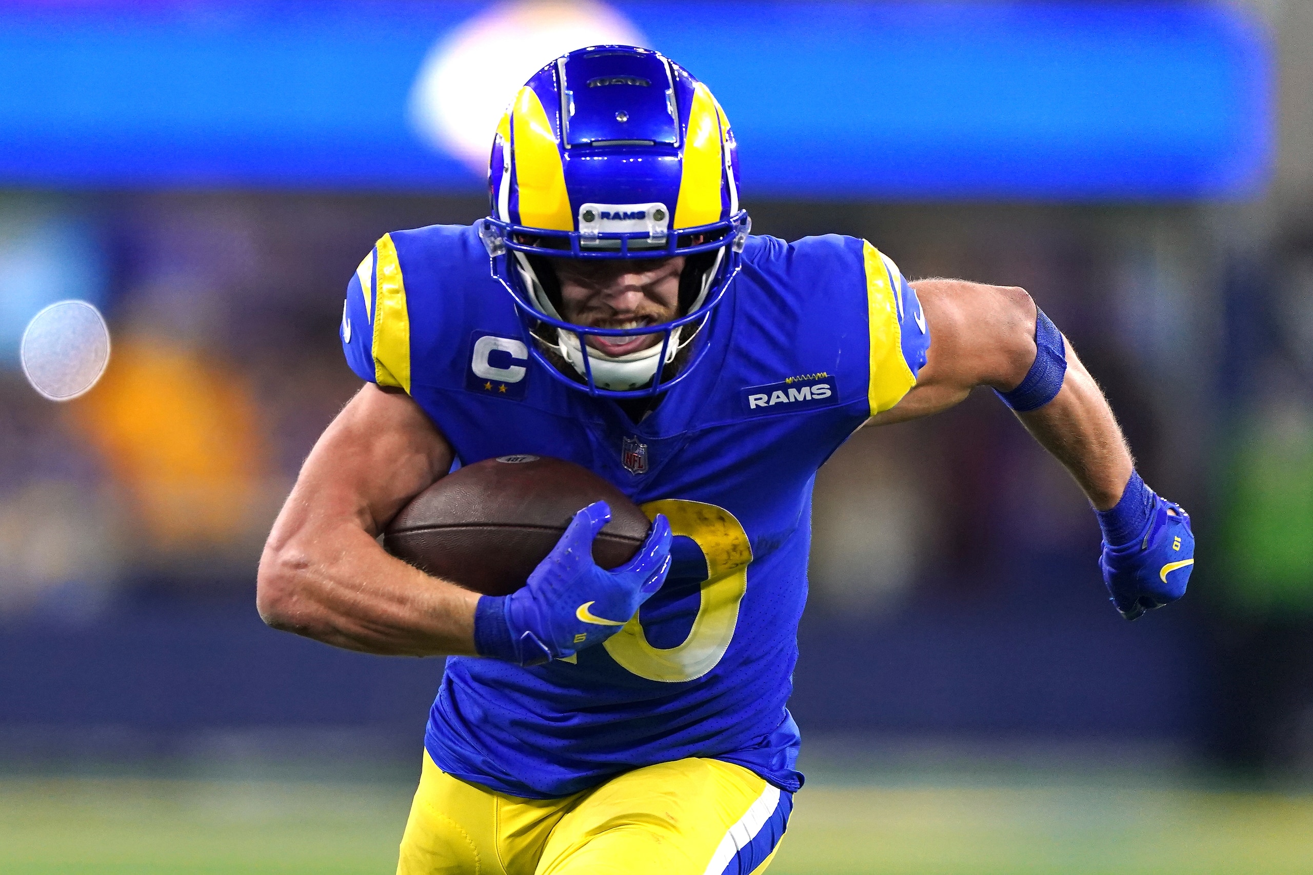 Los Angeles Rams wide receiver Cooper Kupp (10) looks for room to run against the San Francisco 49ers during the NFL NFC Championship game, Sunday, Jan. 30, 2022 in Inglewood, Calif. The Rams defeated the 49ers 20-17. (AP Photo/Doug Benc)