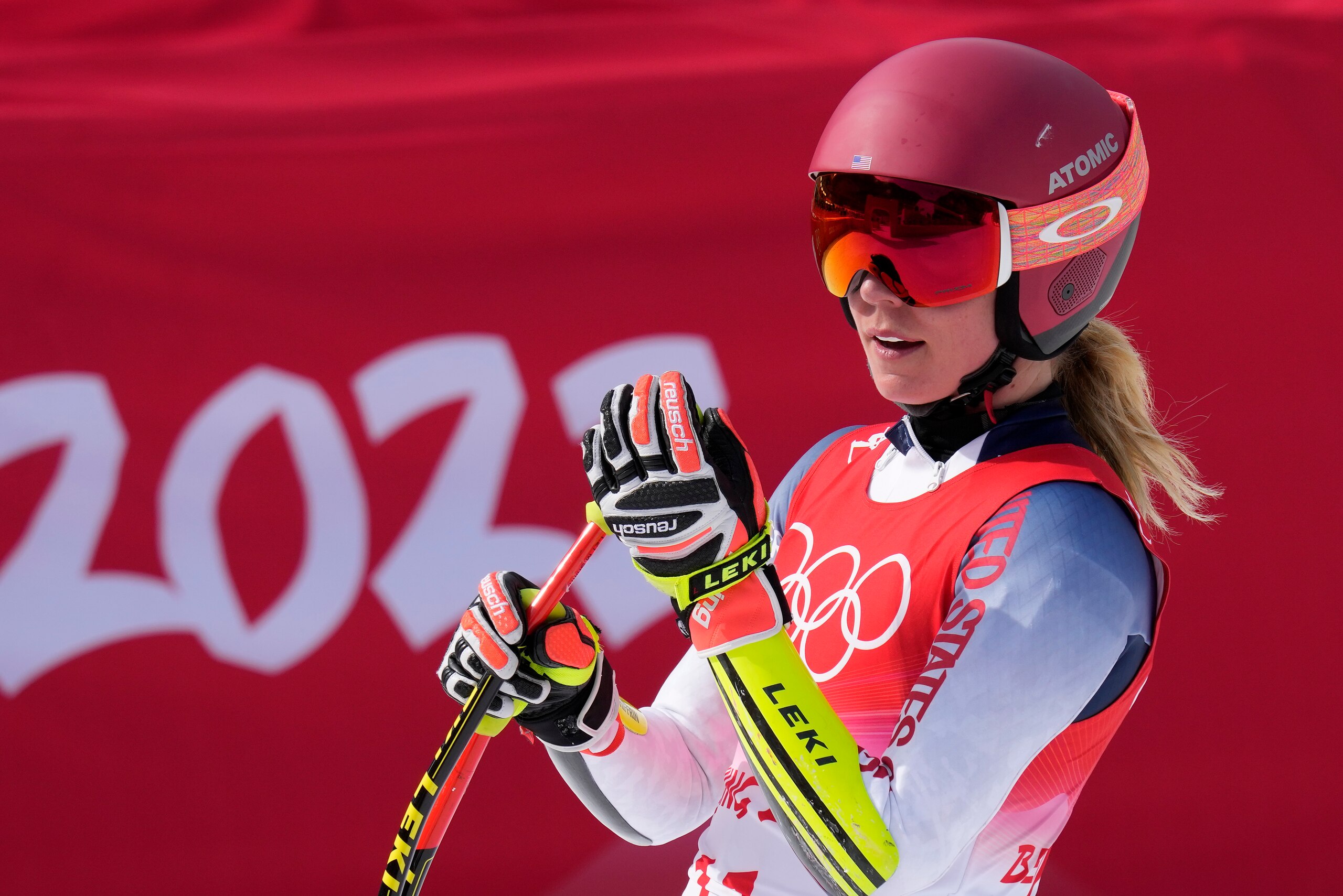 Mikaela Shiffrin, of United States reacts after finishing the women's super-G at the 2022 Winter Olympics, Friday, Feb. 11, 2022, in the Yanqing district of Beijing. (AP Photo/Luca Bruno)