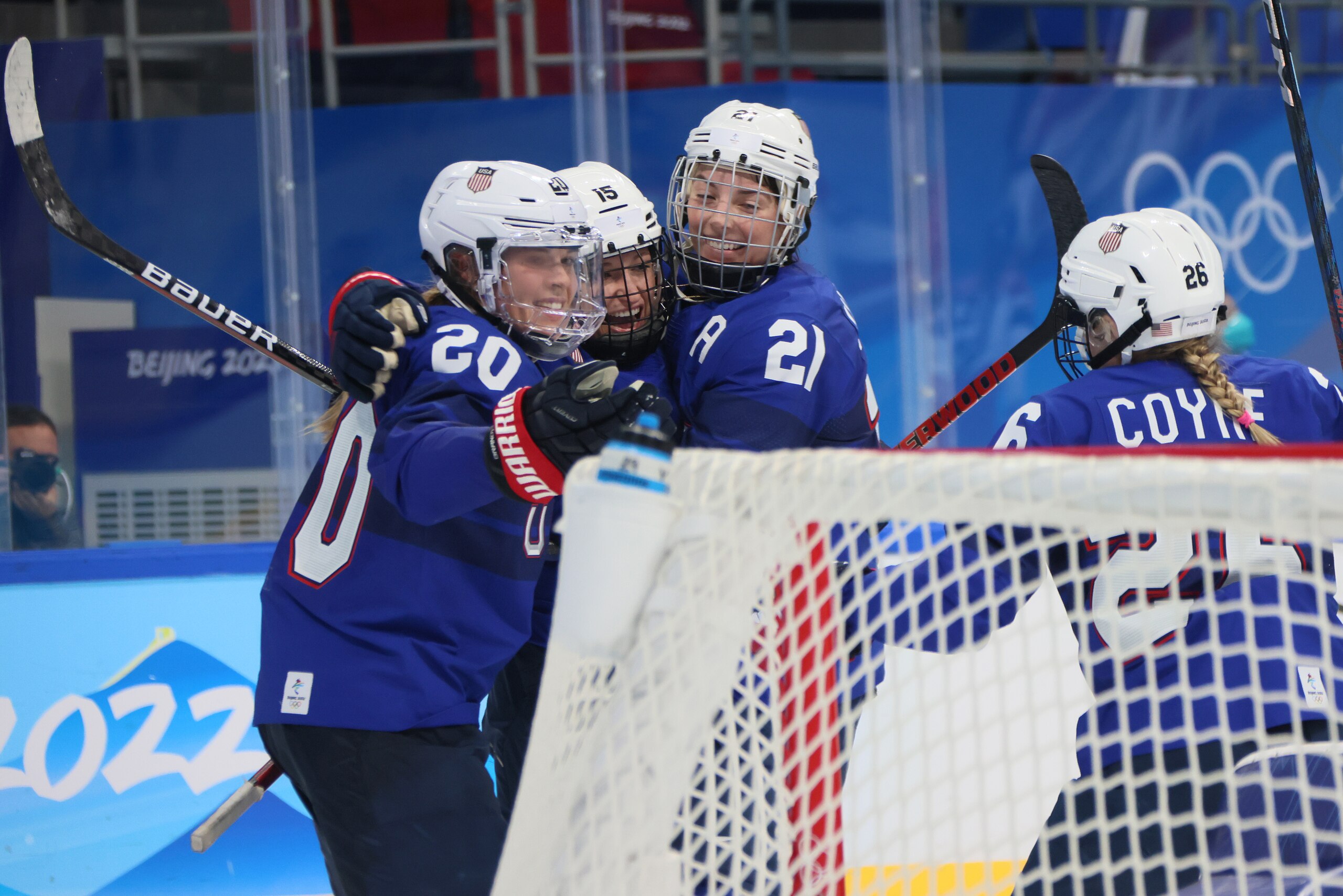 BEIJING, CHINA - FEBRUARY 11: Savannah Harmon #15 of Team United States celebrates her third period goal against Team Czech Republic with Kendall Coyne Schofield #26, Hannah Brandt #20 and Hilary Knight #21 during the Women's Ice Hockey Quarterfinal match on Day 7 of the Beijing 2022 Winter Olympic Games at Wukesong Sports Centre on February 11, 2022 in Beijing, China. (Photo by Bruce Bennett/Getty Images)