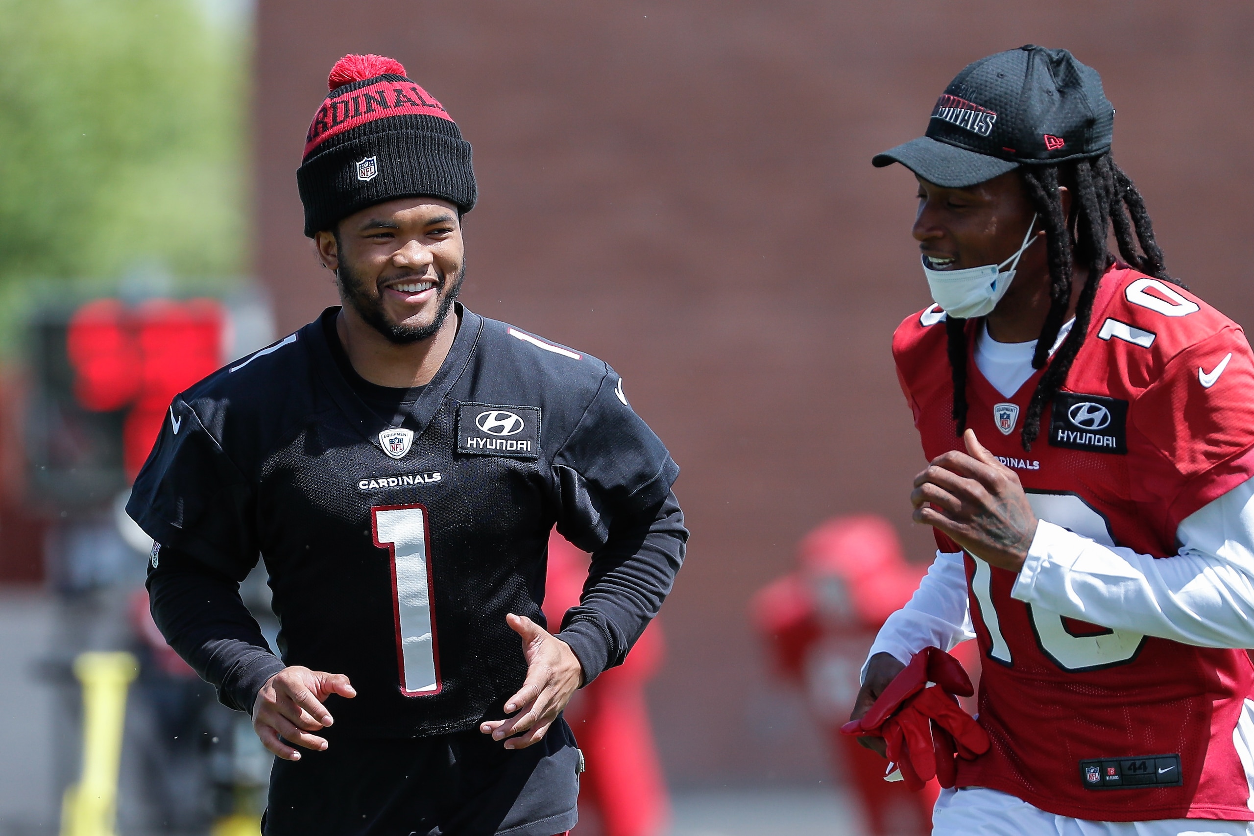 TEMPE, AZ - JUNE 02:  Arizona Cardinals quarterback Kyler Murray (1) and Arizona Cardinals wide receiver DeAndre Hopkins (10) smile during the Arizona Cardinals offseason practice OTAs on June 2, 2021 at Arizona Cardinals Training Facility in Tempe, Arizona.  (Photo by Kevin Abele/Icon Sportswire via Getty Images)