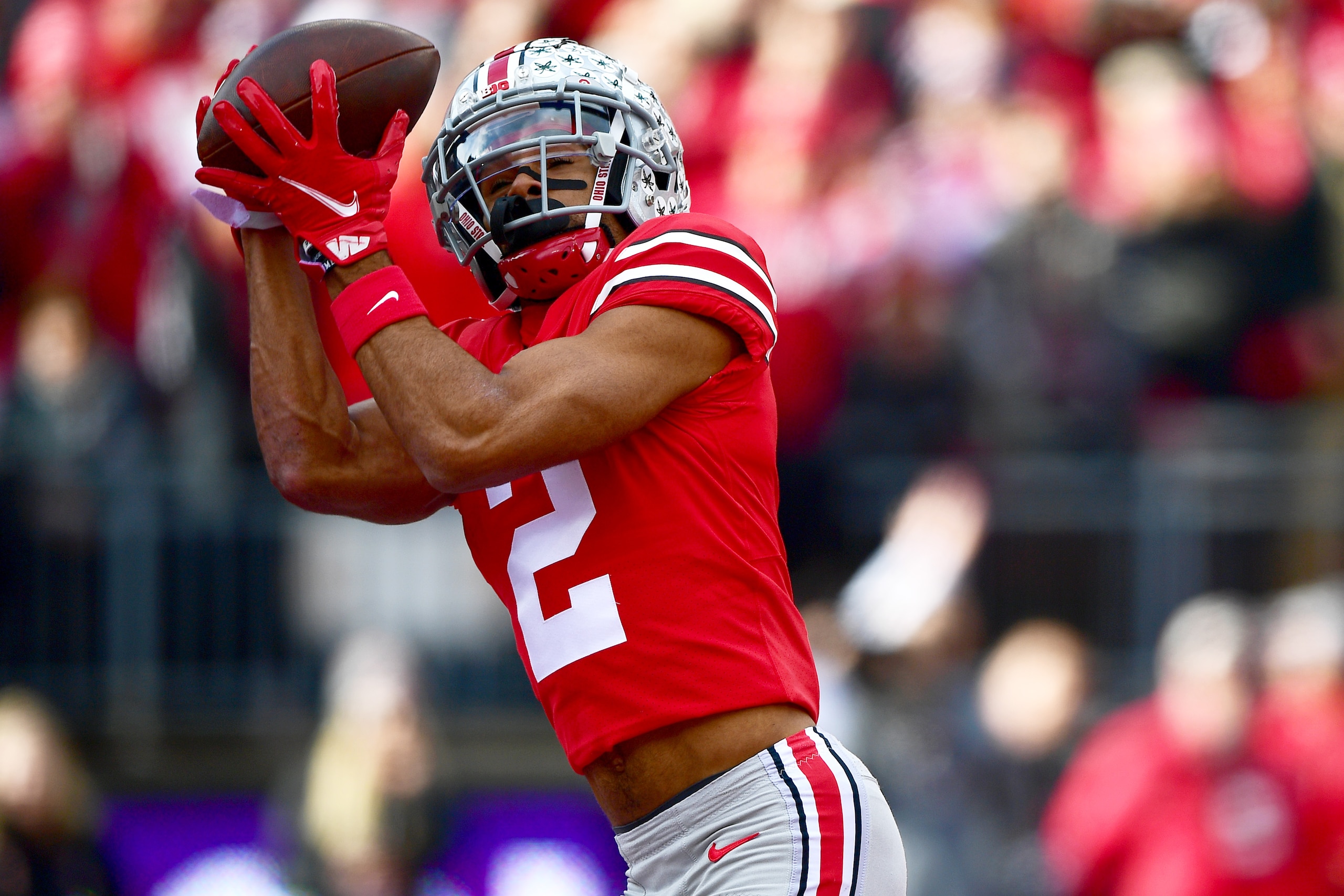 COLUMBUS, OHIO - NOVEMBER 20: Chris Olave #2 of the Ohio State Buckeyes catches a pass for a touchdown during the first half of a game against the Michigan State Spartans at Ohio Stadium on November 20, 2021 in Columbus, Ohio. (Photo by Emilee Chinn/Getty Images)