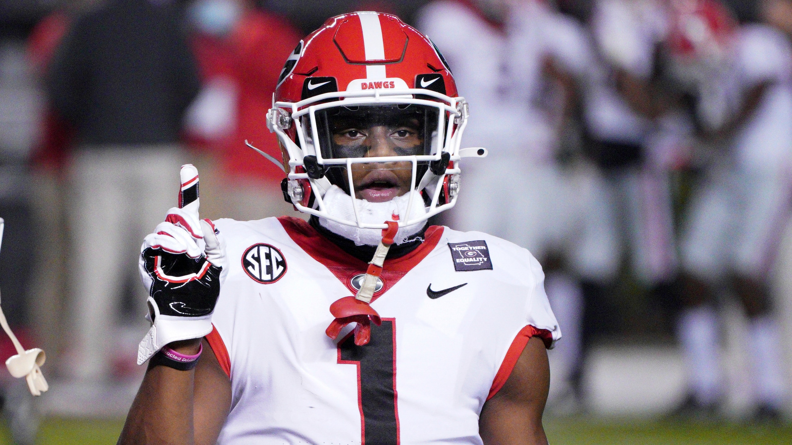Georgia wide receiver George Pickens (1) and Jaylen Johnson (23) warm up before an NCAA college football game against South Carolina Saturday, Nov. 28, 2020, in Columbia, S.C. Georgia won 45-16. (AP Photo/Sean Rayford)