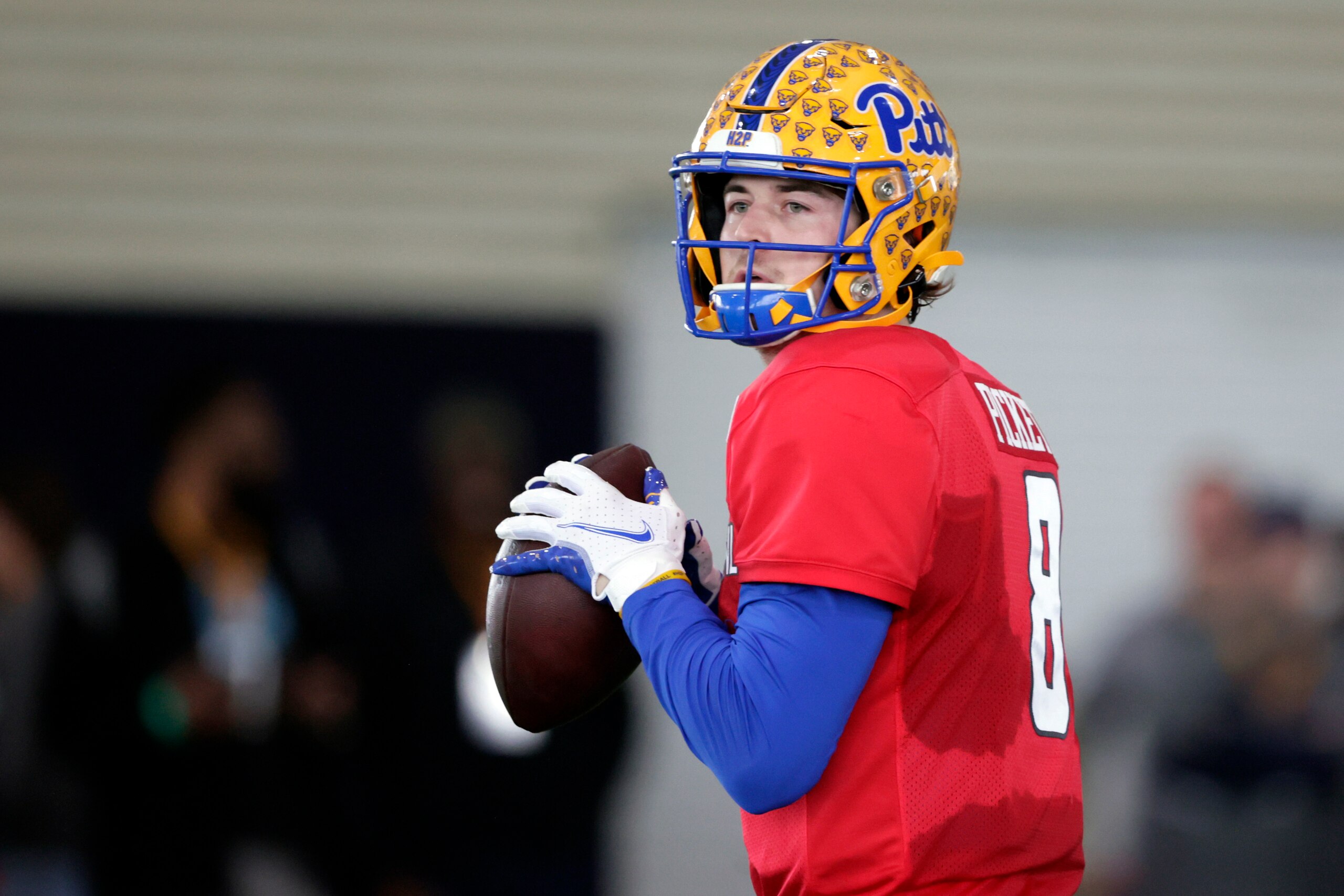 National Team quarterback Kenny Pickett of Pittsburgh (8) runs through drills during practice for the Senior Bowl NCAA college football game Thursday, Feb. 3, 2022, in Mobile, Ala. (AP Photo/Butch Dill)