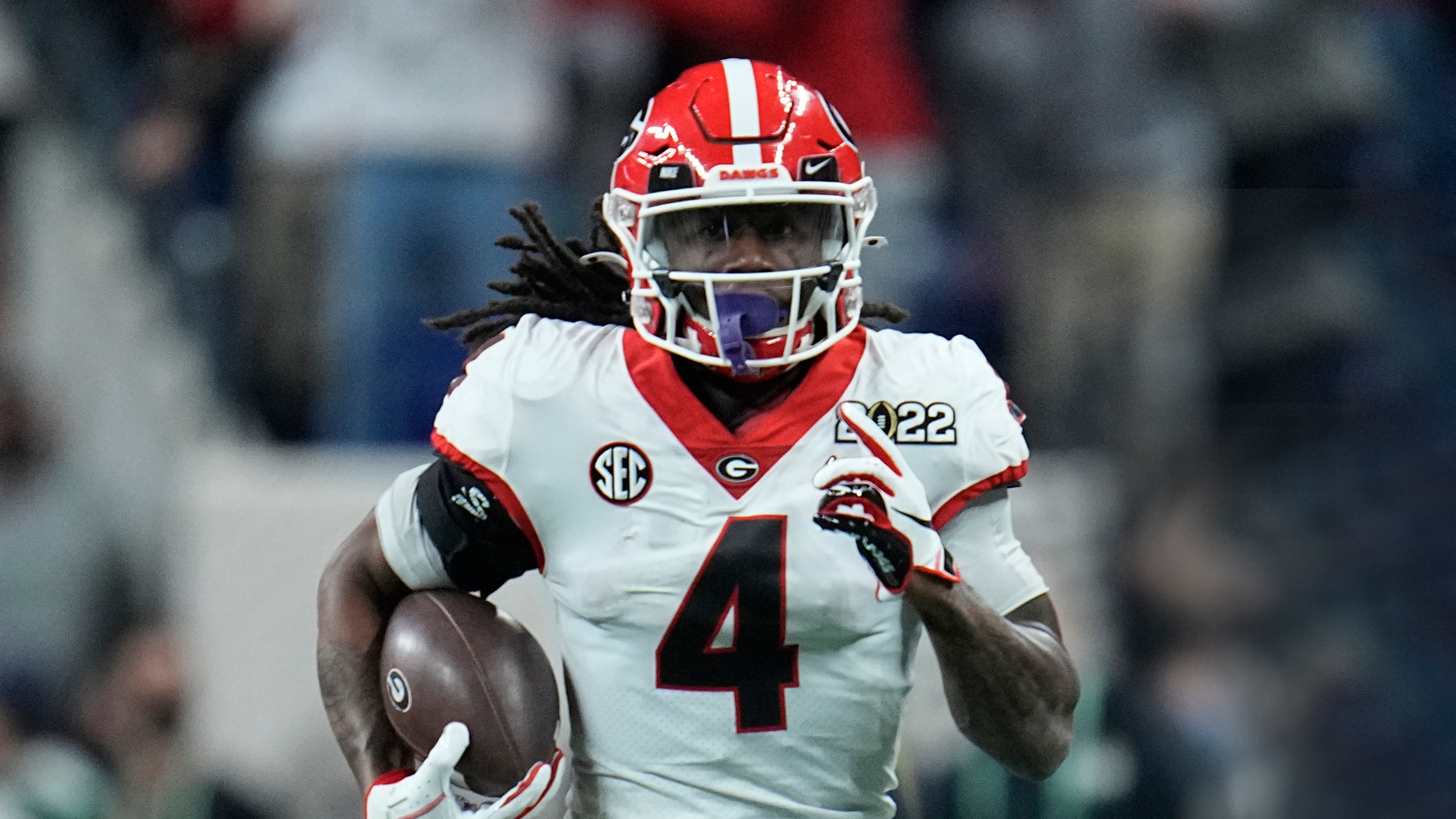 Georgia's James Cook breaks away during the second half of the College Football Playoff championship football game against Alabama Monday, Jan. 10, 2022, in Indianapolis. (AP Photo/Paul Sancya)