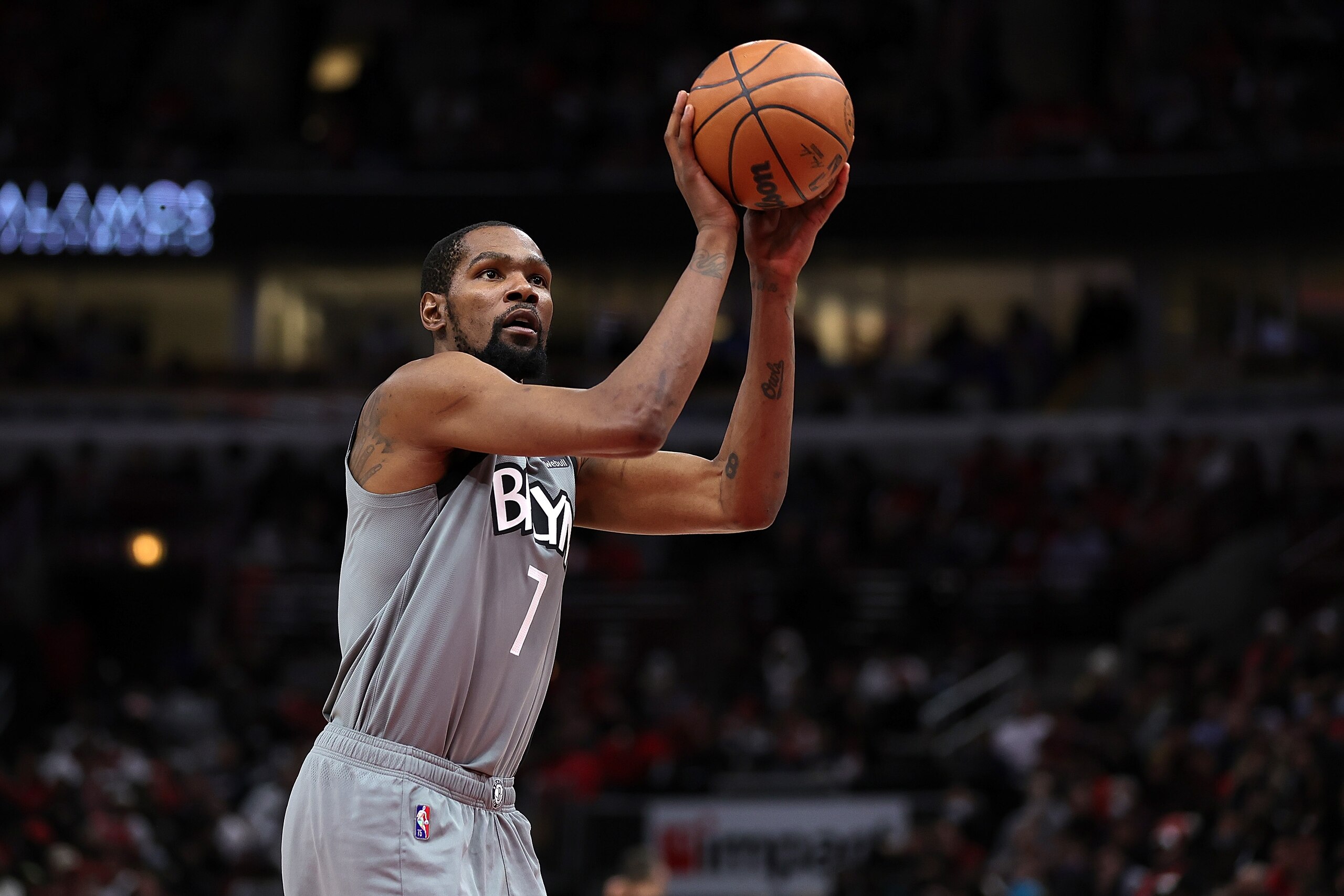 CHICAGO, ILLINOIS - JANUARY 12: Kevin Durant #7 of the Brooklyn Nets shoots a free throw during the second half of a game against the Chicago Bulls at United Center on January 12, 2022 in Chicago, Illinois. NOTE TO USER: User expressly acknowledges and agrees that, by downloading and or using this photograph, User is consenting to the terms and conditions of the Getty Images License Agreement. (Photo by Stacy Revere/Getty Images)