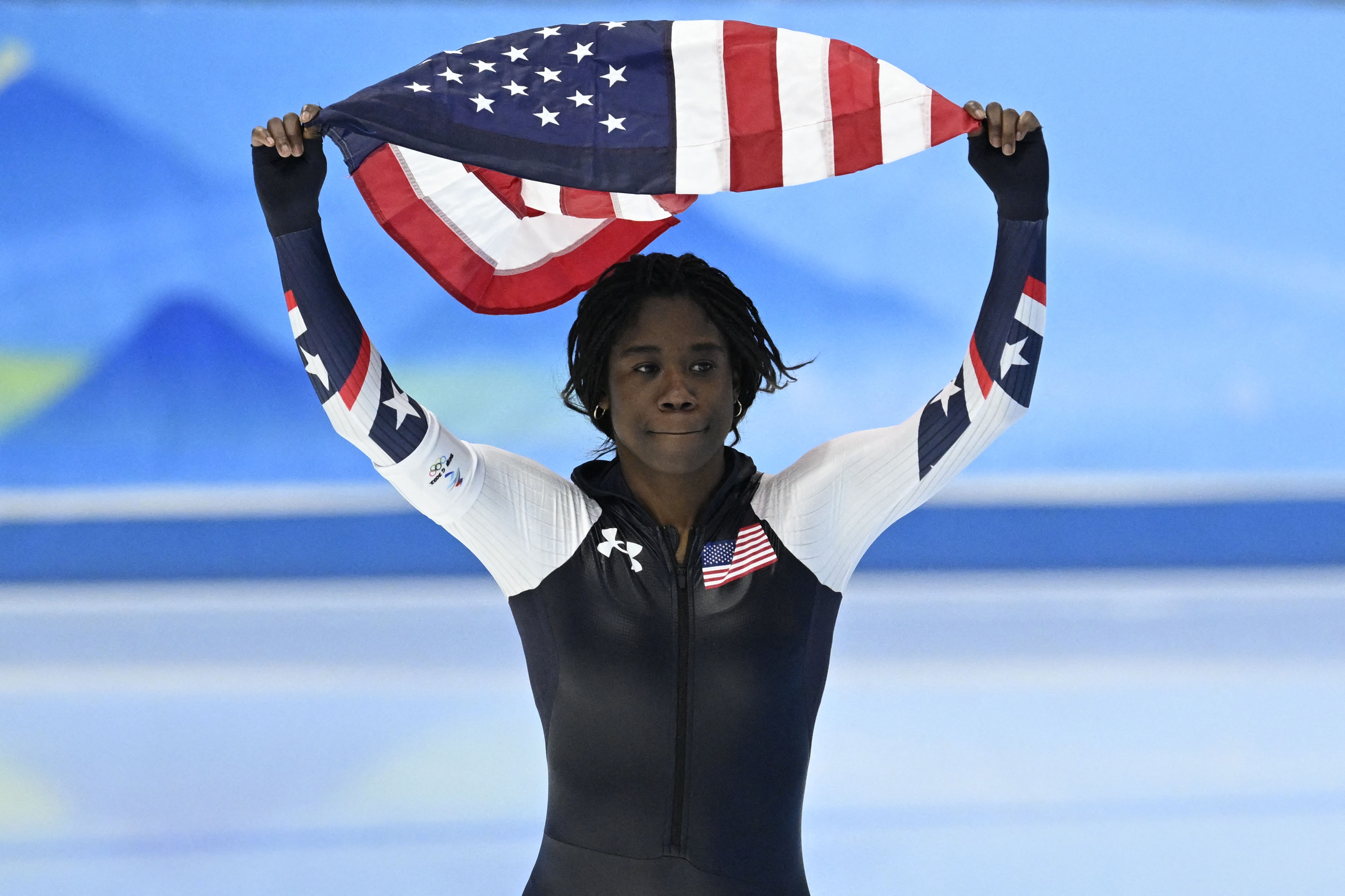 USA's Erin Jackson celebrates her gold medal in the women's 500m speed skating event during the Beijing 2022 Winter Olympic Games at the National Speed Skating Oval in Beijing on February 13, 2022. (Photo by WANG Zhao / AFP) (Photo by WANG ZHAO/AFP via Getty Images)