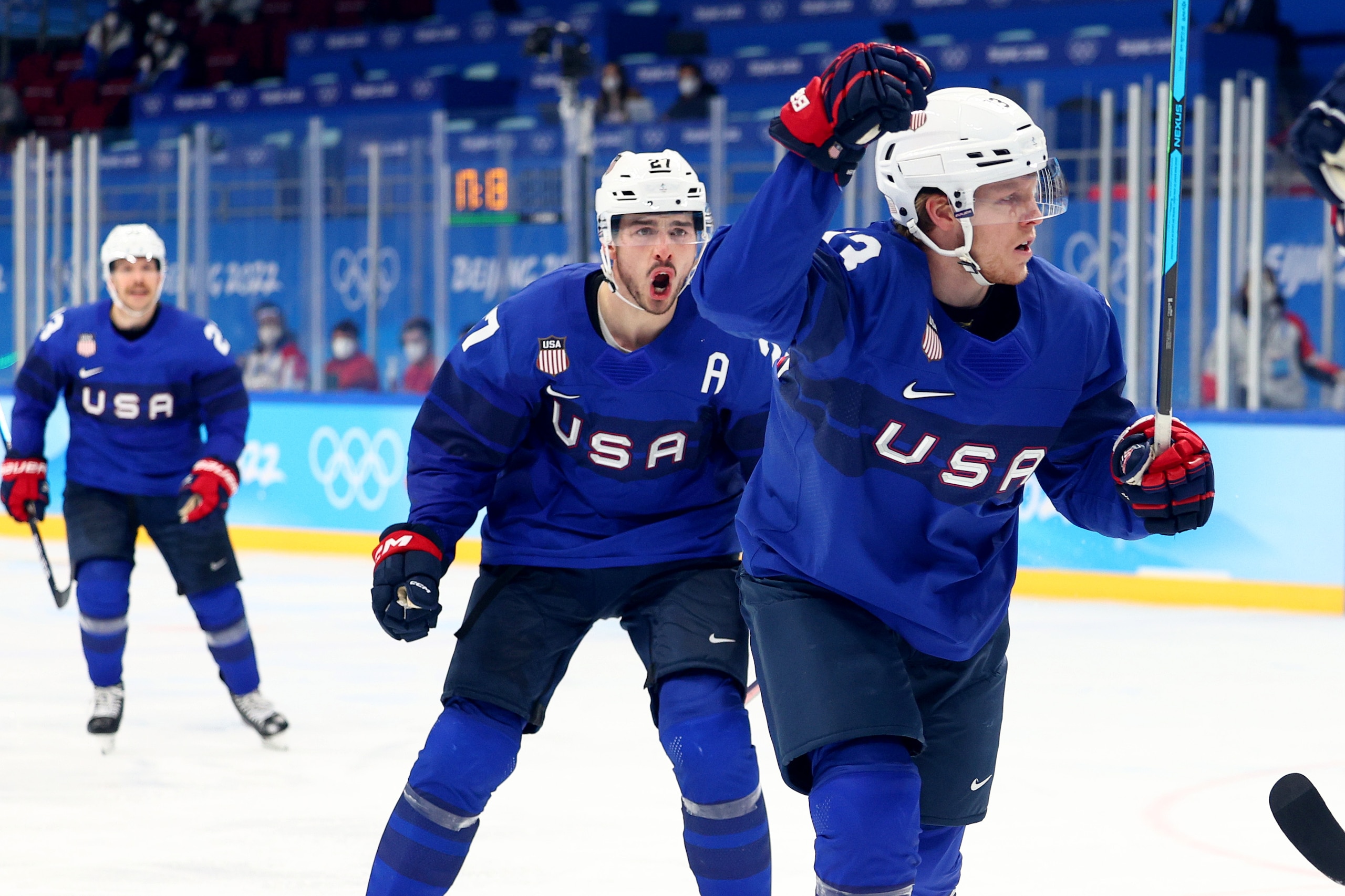 BEIJING, CHINA - FEBRUARY 13: Nathan Smith #13 of Team United States reacts after scoring during the Men's Ice Hockey Preliminary Round Group A match between Team United States and Team Germany on Day 9 of the Beijing 2022 Winter Olympic Games at Wukesong Sports Centre on February 13, 2022 in Beijing, China. (Photo by Elsa/Getty Images)