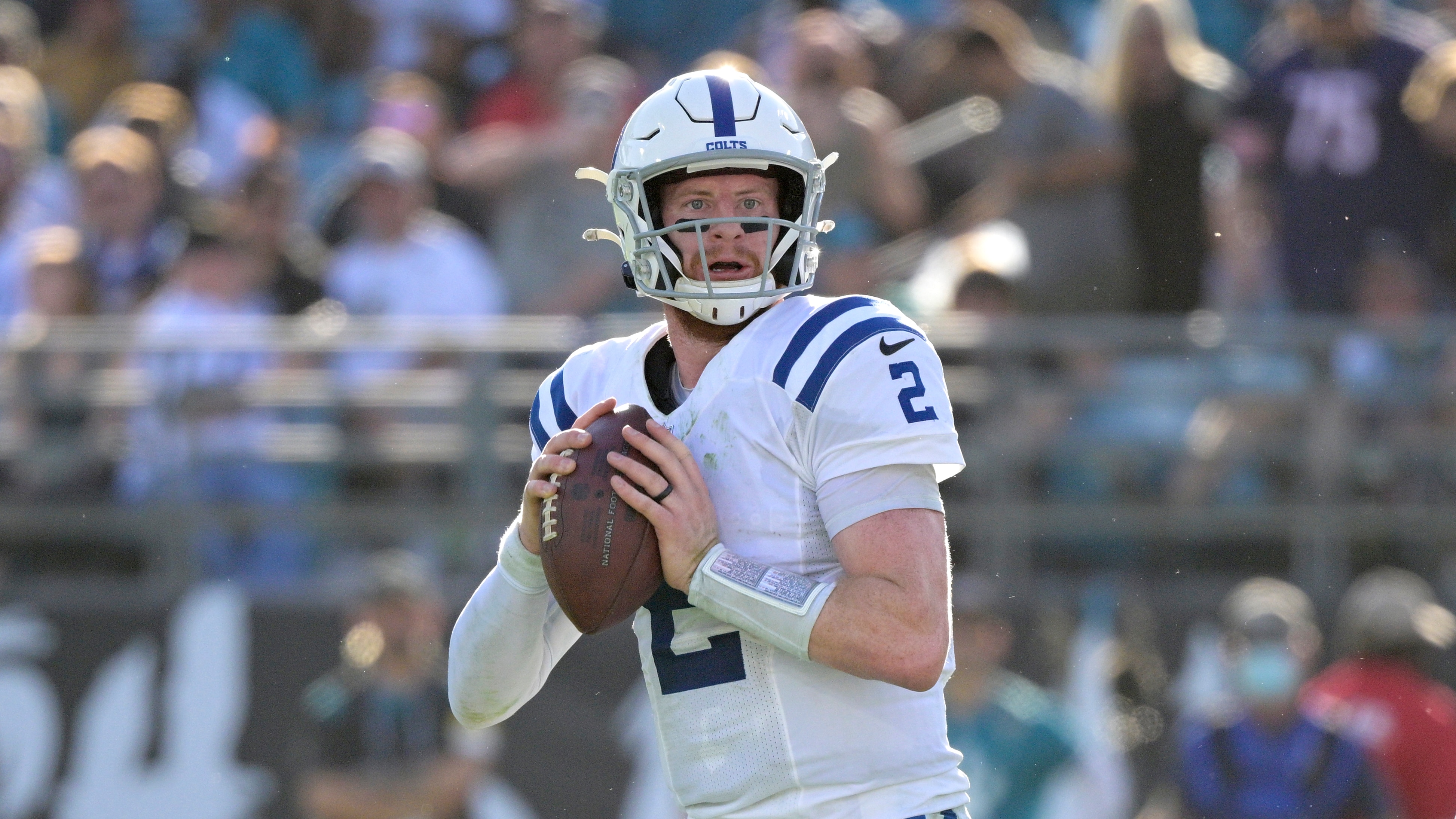 Indianapolis Colts quarterback Carson Wentz (2) looks for a receiver during the second half of an NFL football game against the Jacksonville Jaguars, Sunday, Jan. 9, 2022, in Jacksonville, Fla. (AP Photo/Phelan M. Ebenhack)