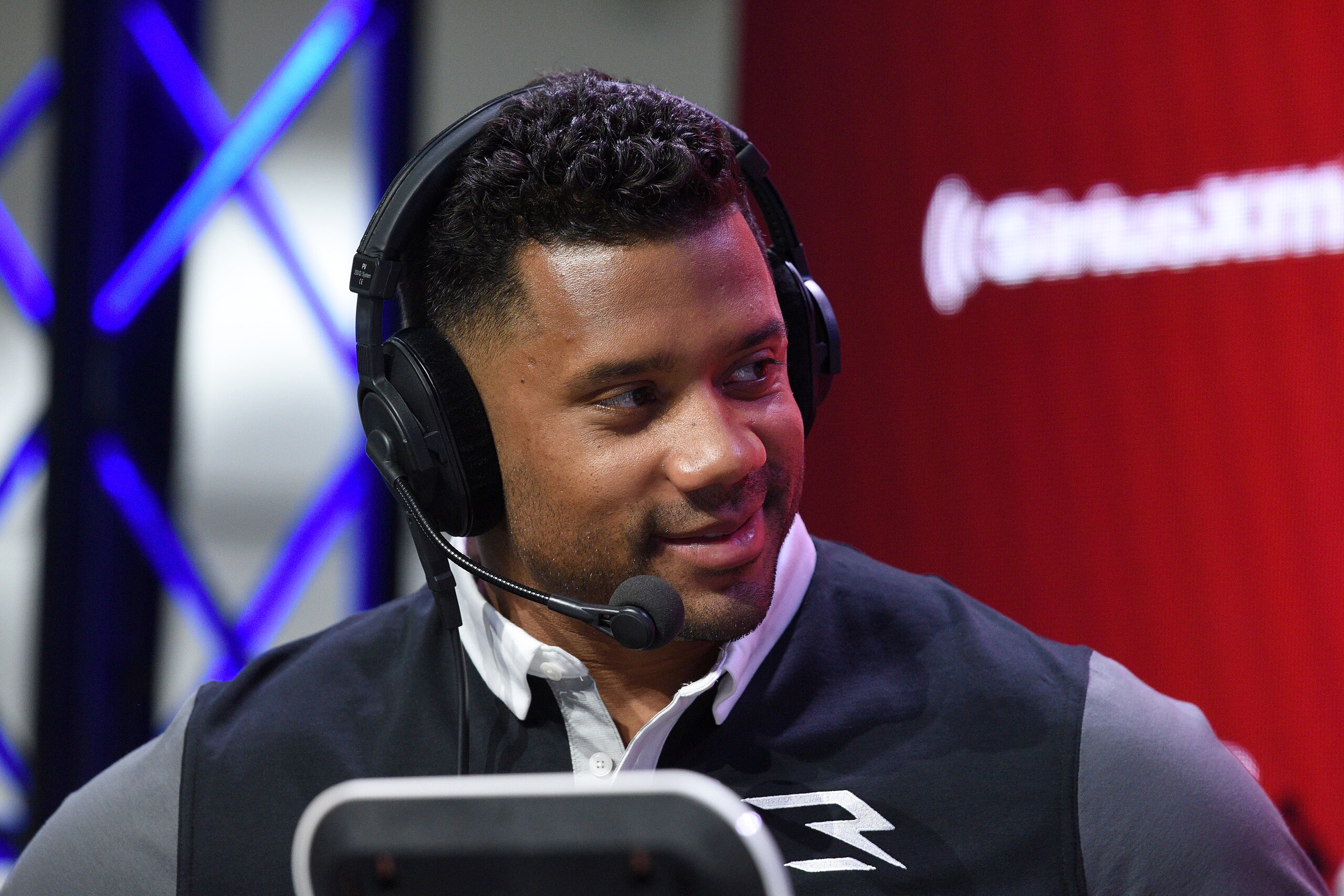 LOS ANGELES, CALIFORNIA - FEBRUARY 11: Russell Wilson of the Seattle Seahawks speaks during an interview on day 3 of SiriusXM At Super Bowl LVI on February 11, 2022 in Los Angeles, California. (Photo by Vivien Killilea/Getty Images for SiriusXM )
