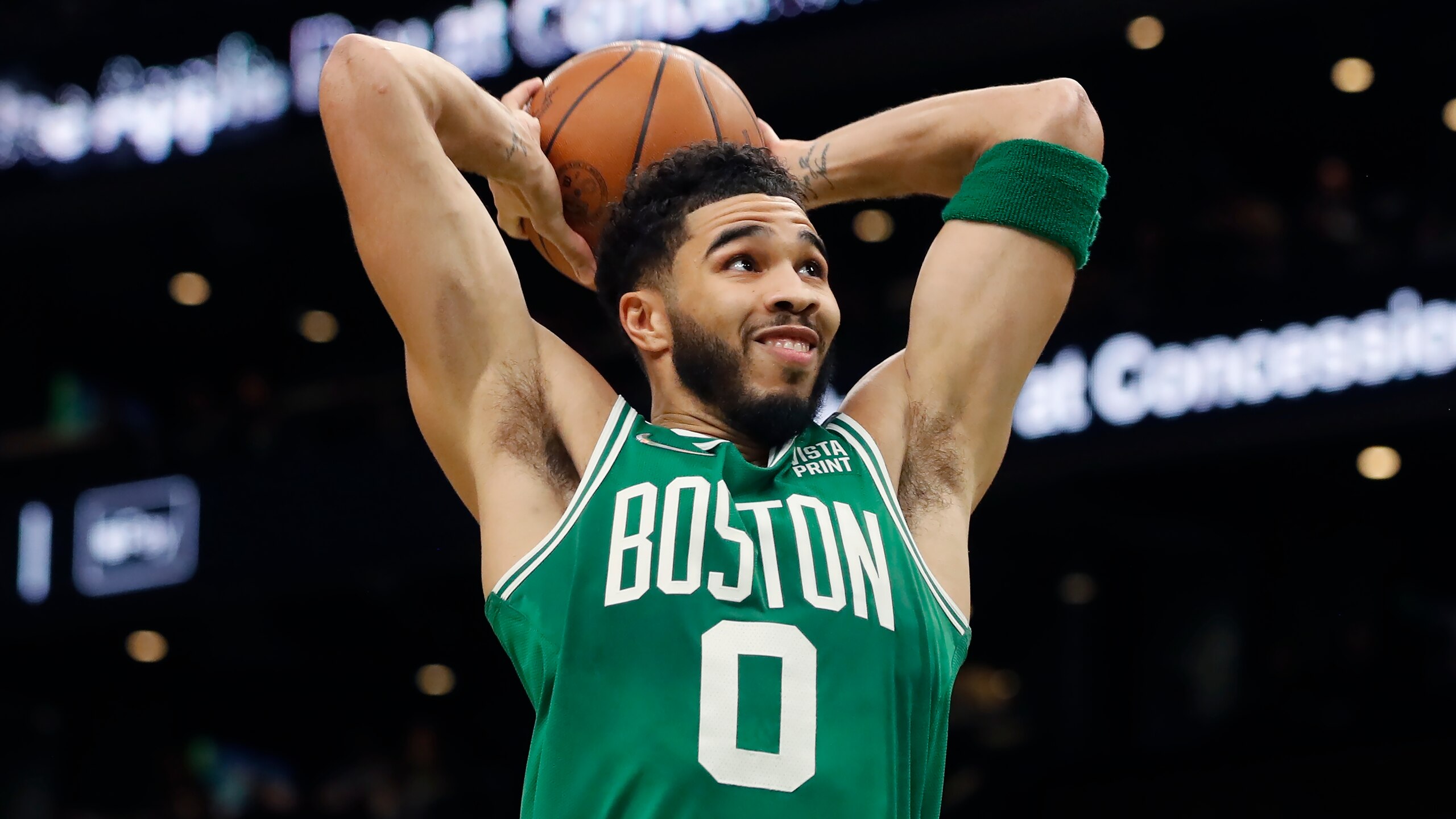 Boston Celtics' Jayson Tatum plays against the Denver Nuggets during the first half of an NBA basketball game, Friday, Feb. 11, 2022, in Boston. (AP Photo/Michael Dwyer)