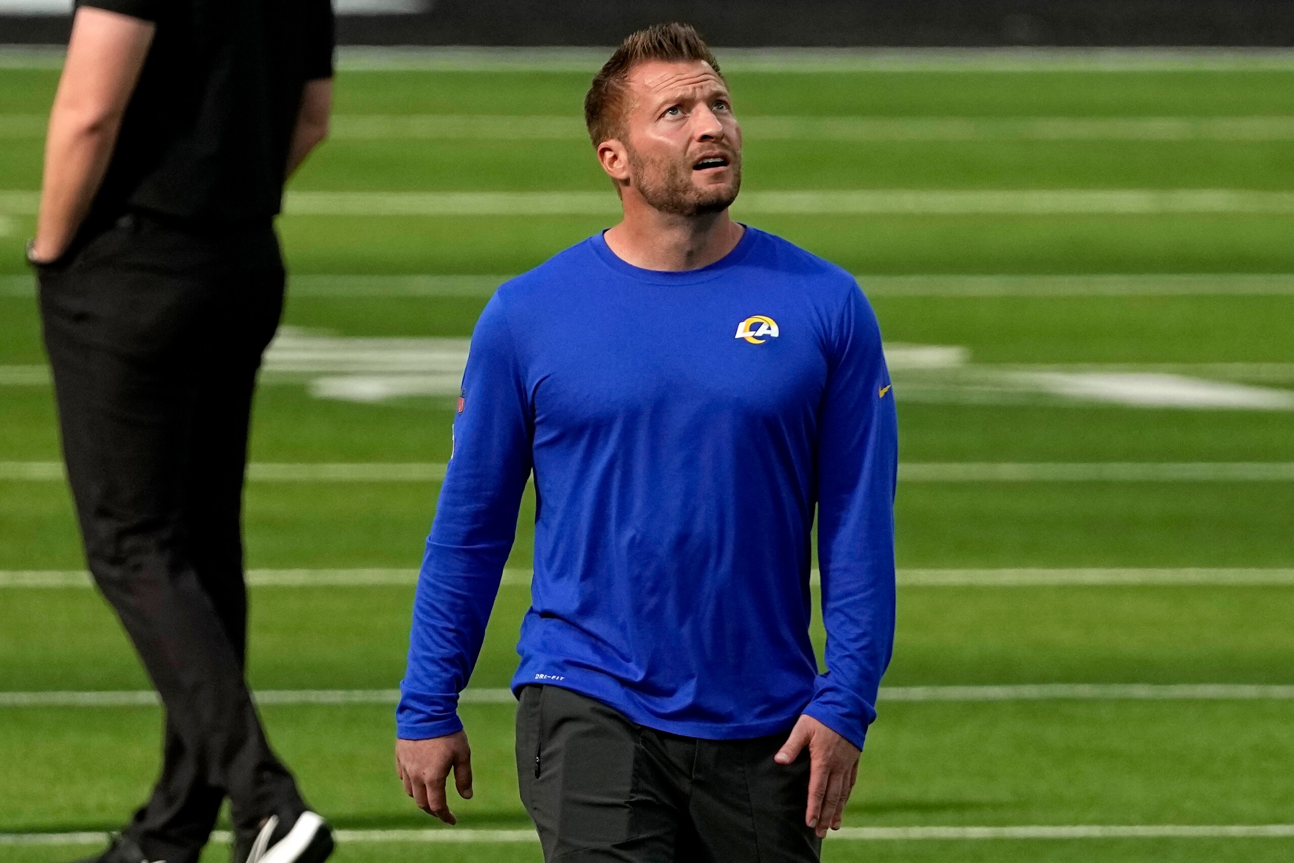 Los Angeles Rams head coach Sean McVay walks the turf before the NFL Super Bowl 56 football game between the Los Angeles Rams and the Cincinnati Bengals, Sunday, Feb. 13, 2022, in Inglewood, Calif. (AP Photo/Tony Gutierrez)