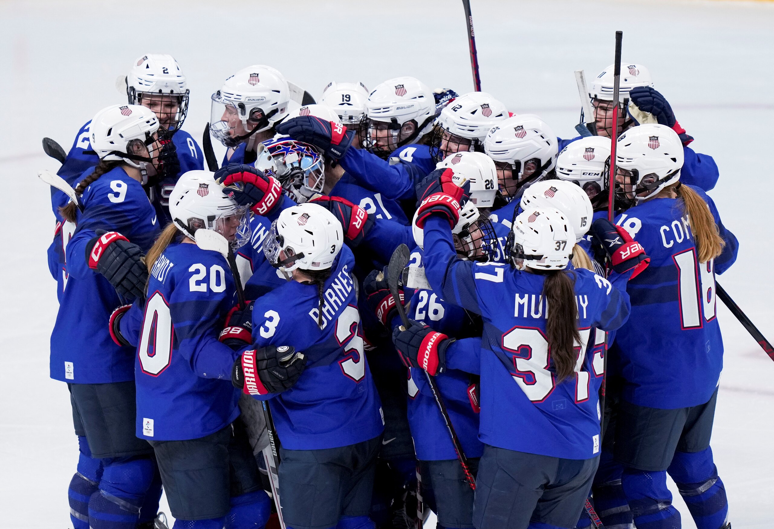 Athletes of the United States celebrate after the ice hockey women's playoff quaterfinals between the United States and Czech Republic at Wukesong Sports Centre in Beijing, capital of China, Feb. 11, 2022. (Photo by Meng Yongmin/Xinhua via Getty Images)