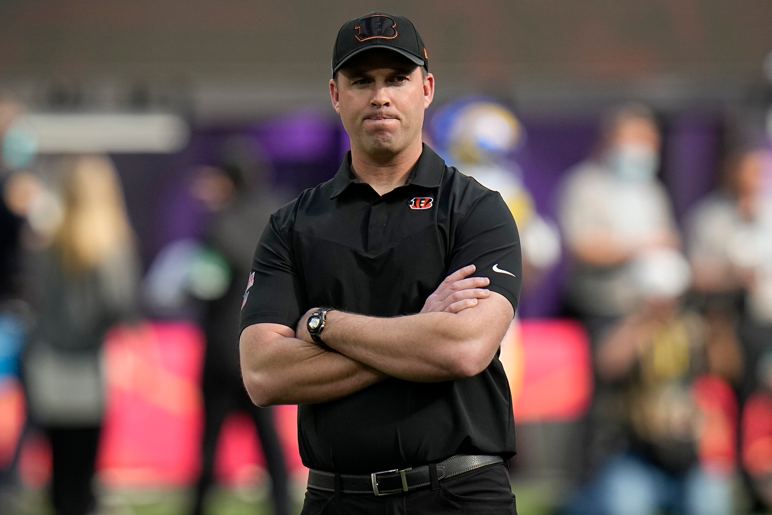 Cincinnati Bengals head coach Zac Taylor watches warmups before the NFL Super Bowl 56 football game against the Los Angeles Rams, Sunday, Feb. 13, 2022, in Inglewood, Calif. (AP Photo/Chris O'Meara)