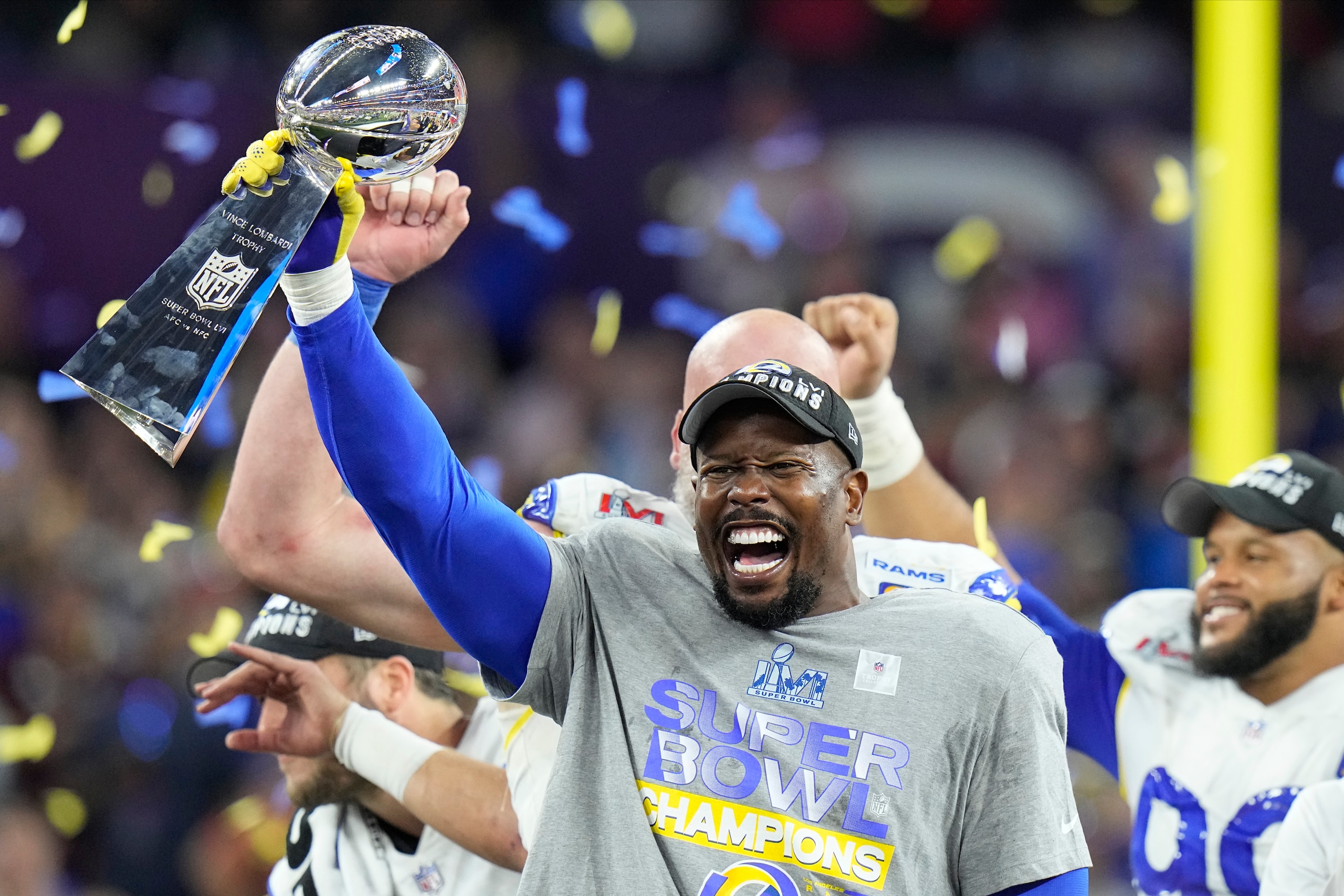 Los Angeles Rams outside linebacker Von Miller holds up the Lombardi Trophy after the Rams defeated the Cincinnati Bengals in the NFL Super Bowl 56 football game Sunday, Feb. 13, 2022, in Inglewood, Calif. (AP Photo/Chris O'Meara) Los Angeles Rams outside linebacker Von Miller holds up the Lombardi Trophy after the Rams defeated the Cincinnati Bengals in the NFL Super Bowl 56 football game Sunday, Feb. 13, 2022, in Inglewood, Calif. (AP Photo/Chris O'Meara)