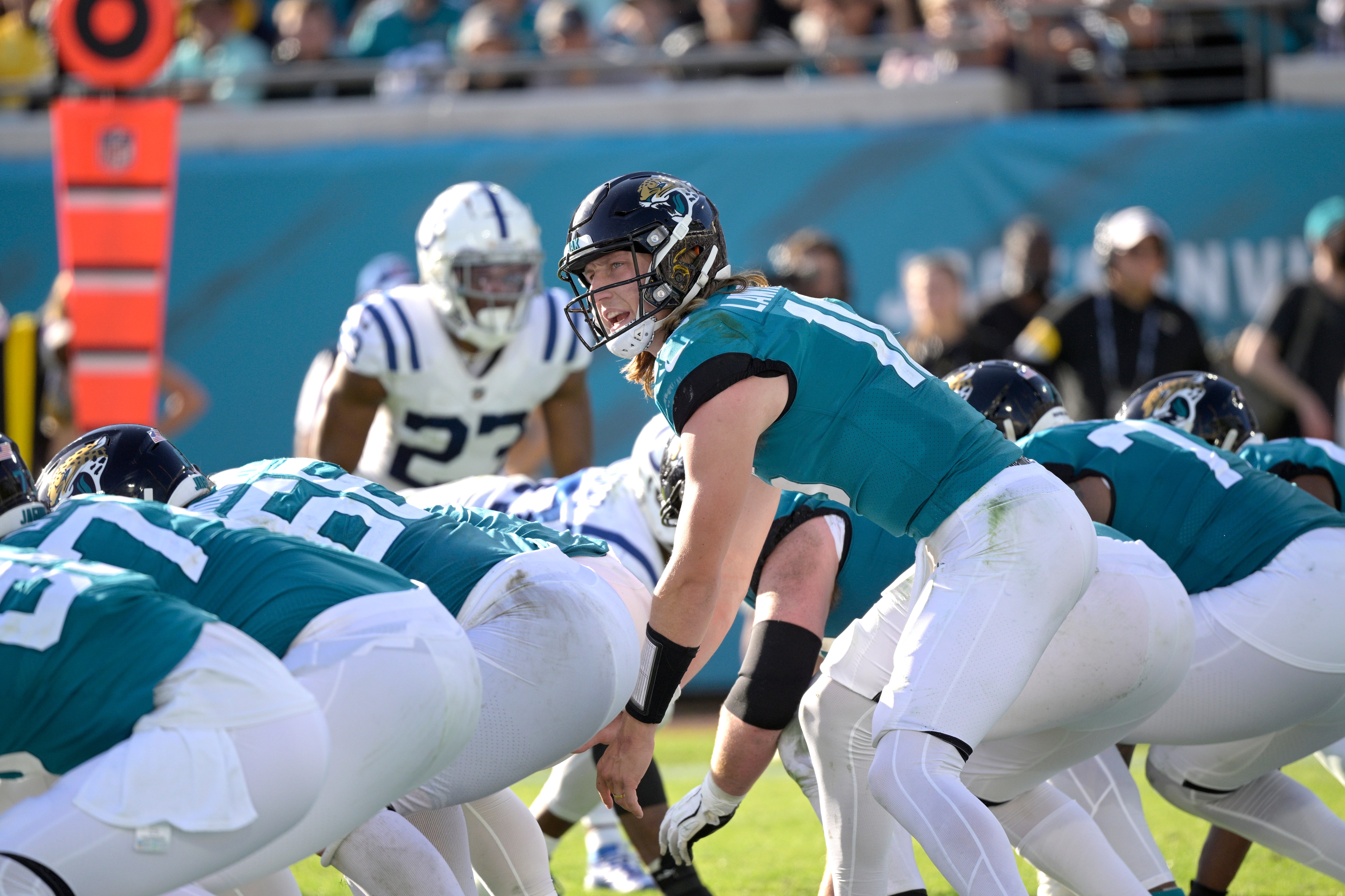 Jacksonville Jaguars quarterback Trevor Lawrence (16) calls out signals at the line of scrimmage during the second half of an NFL football game against the Indianapolis Colts, Sunday, Jan. 9, 2022, in Jacksonville, Fla. (AP Photo/Phelan M. Ebenhack)